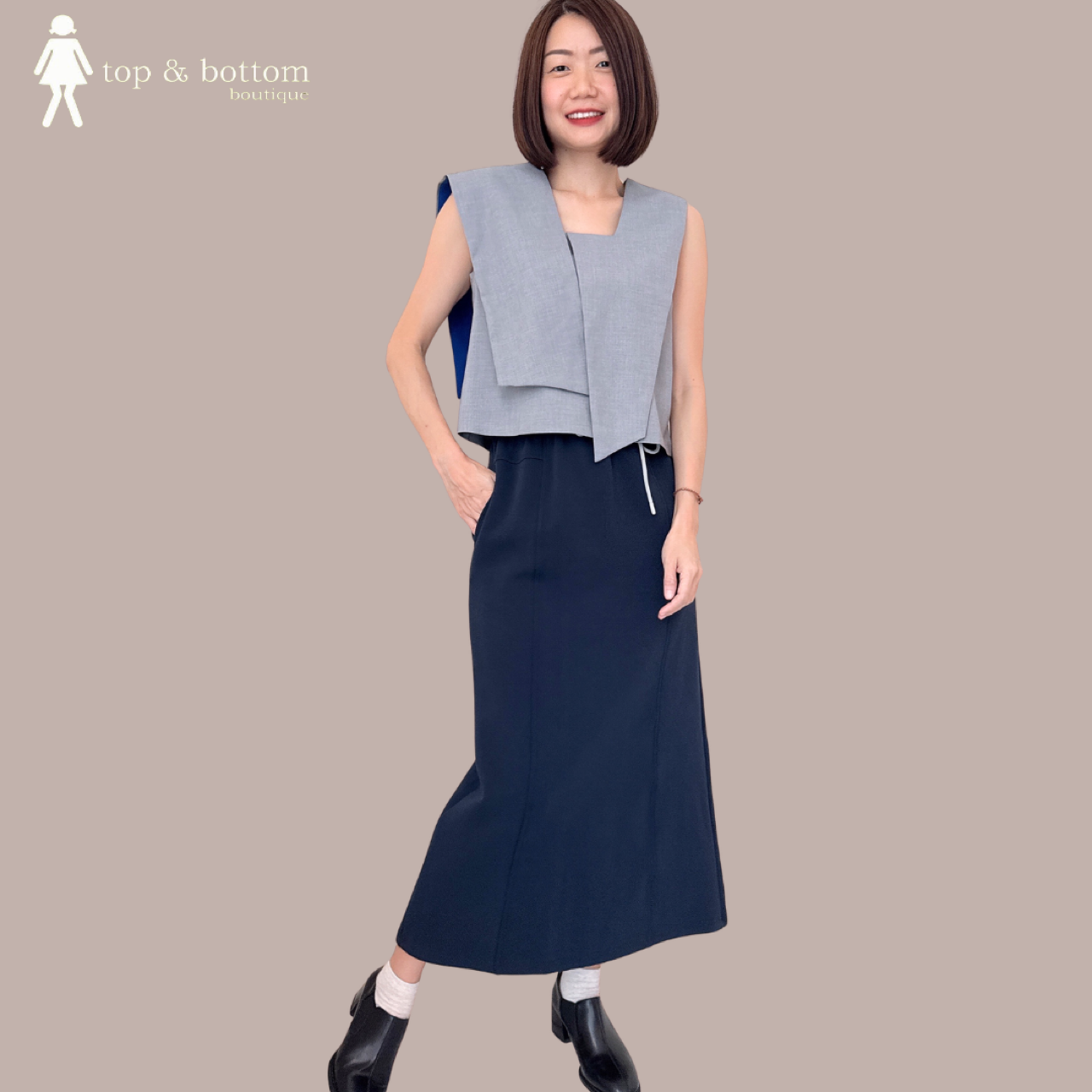 SOLID ASYMMETRIC CROP BLOUSE