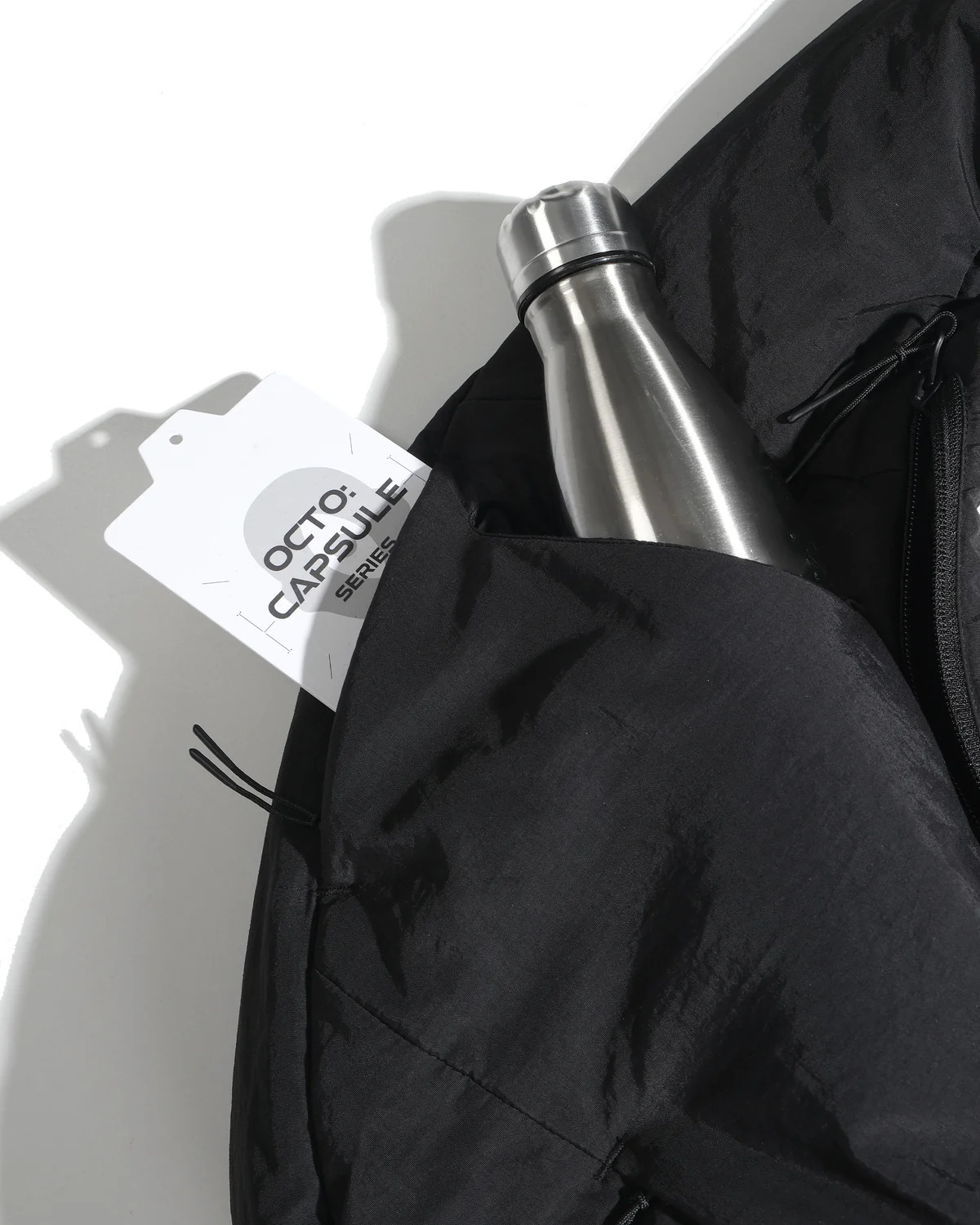 Octo Gambol Offset Void Crescent Bag - Black | S26-C2-B