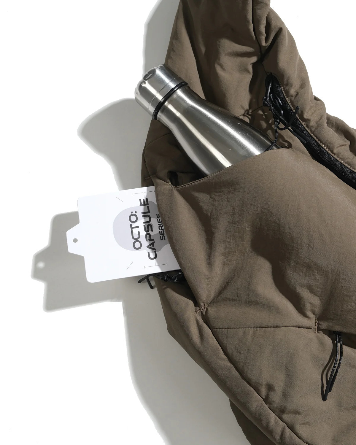 Octo Gambol Offset Void Crescent Bag - Brown | S26-C2-B
