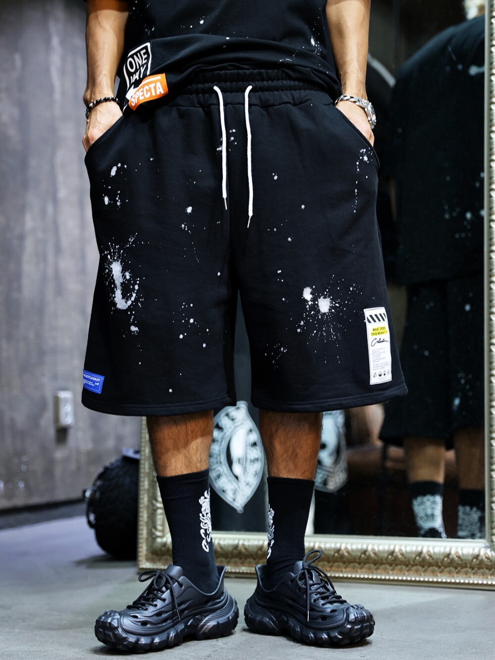 Spray-painted patch shorts