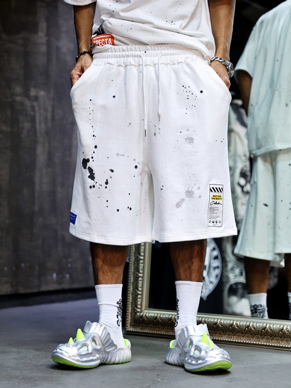 Spray-painted patch shorts