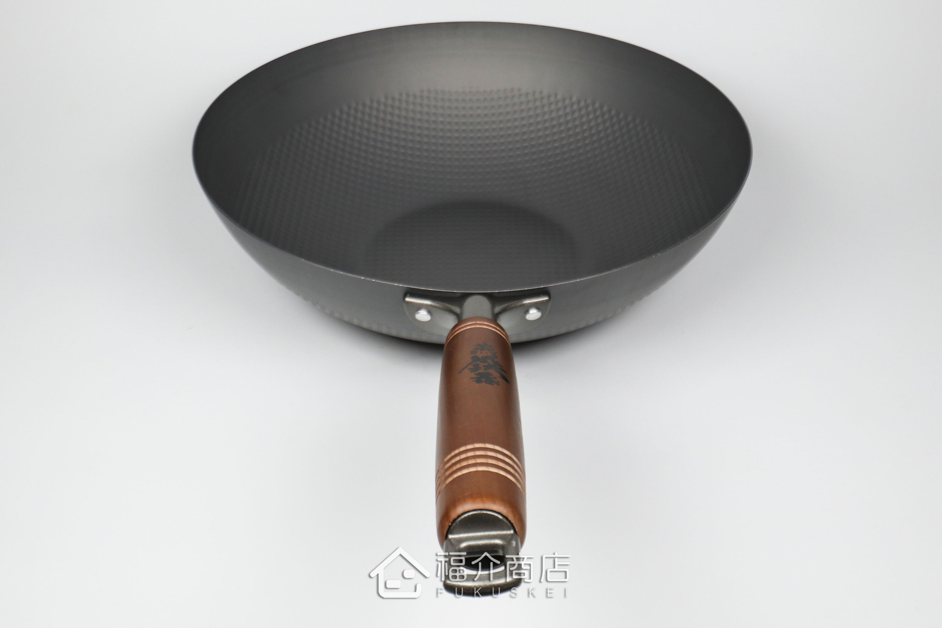 木柄手把的窒化鐵炒鍋
