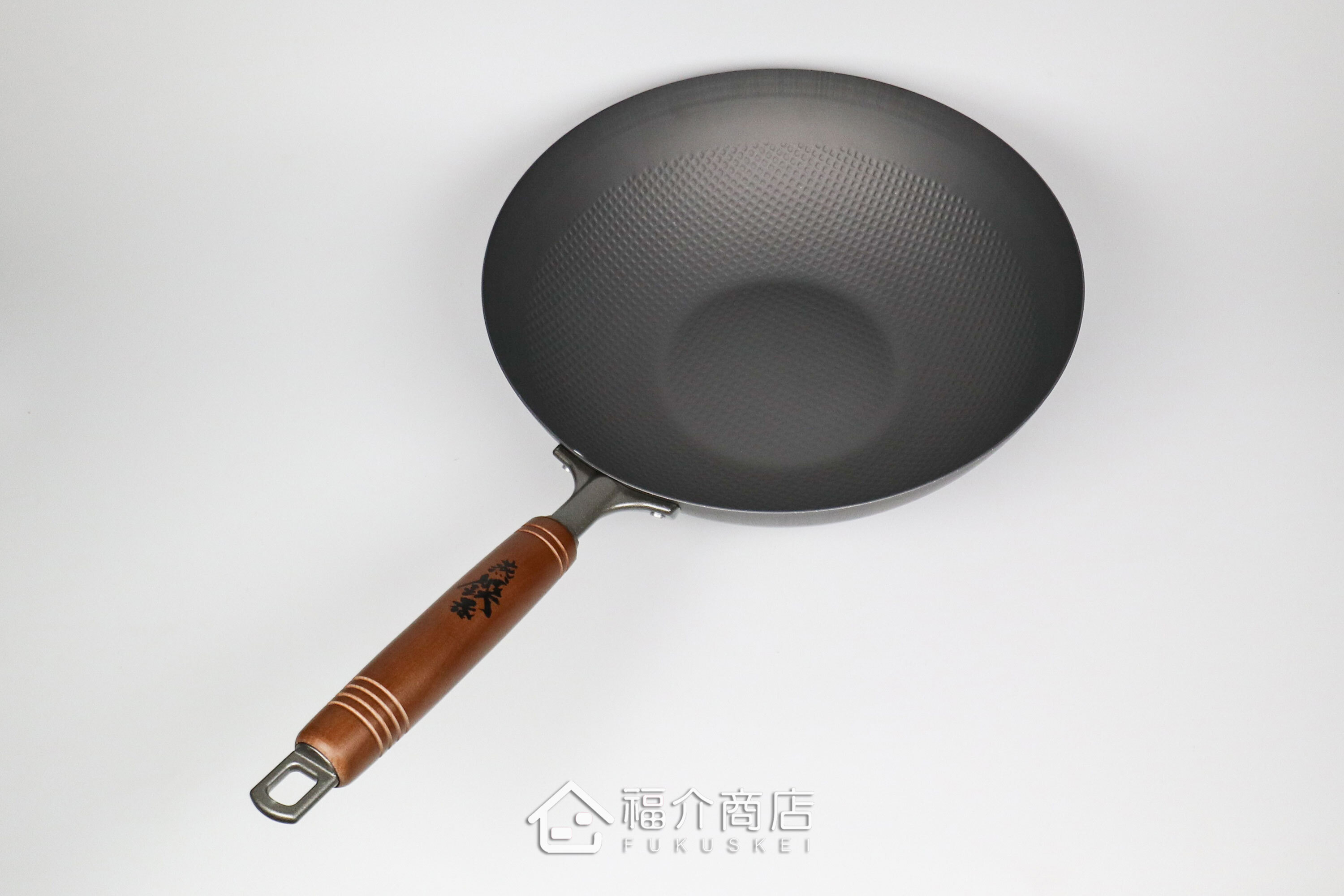 木柄手把的窒化鐵炒鍋