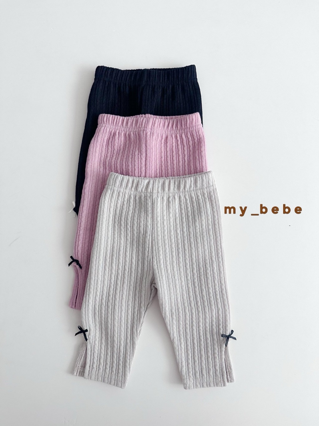 正韓秋Mybebe 三色蝴蝶結開衩內搭褲