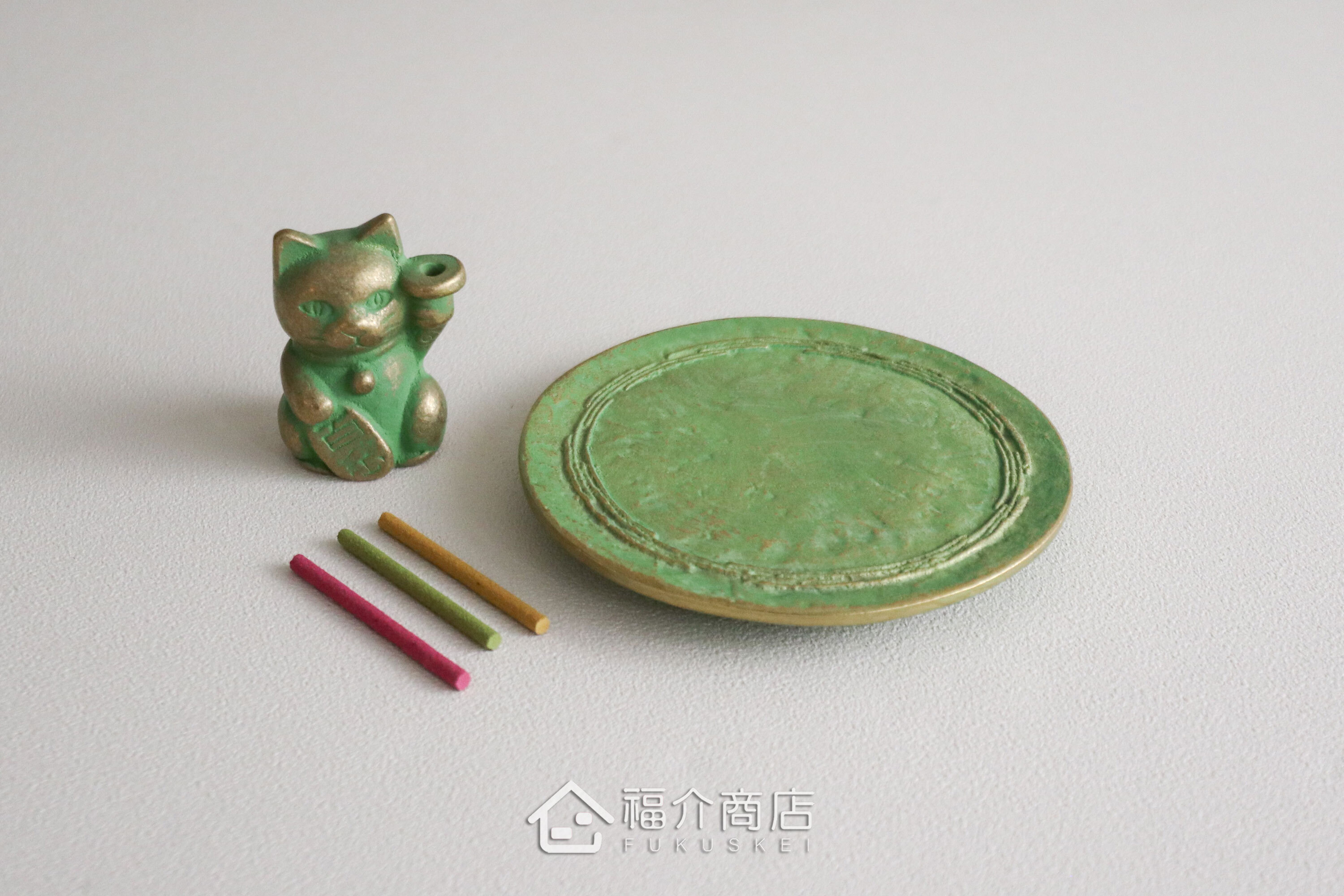 銅製招財貓造型的線香座