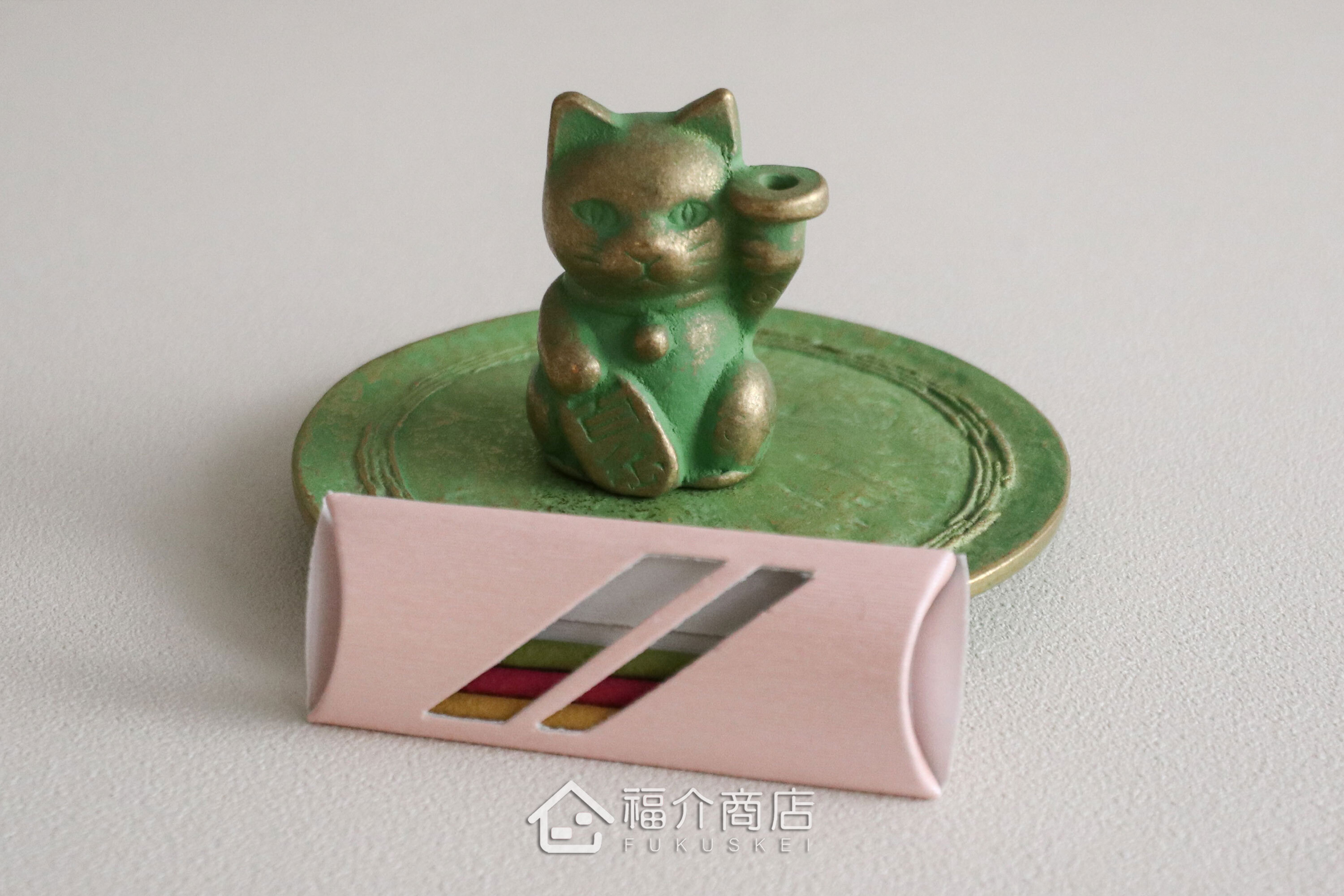 銅製招財貓造型的線香座