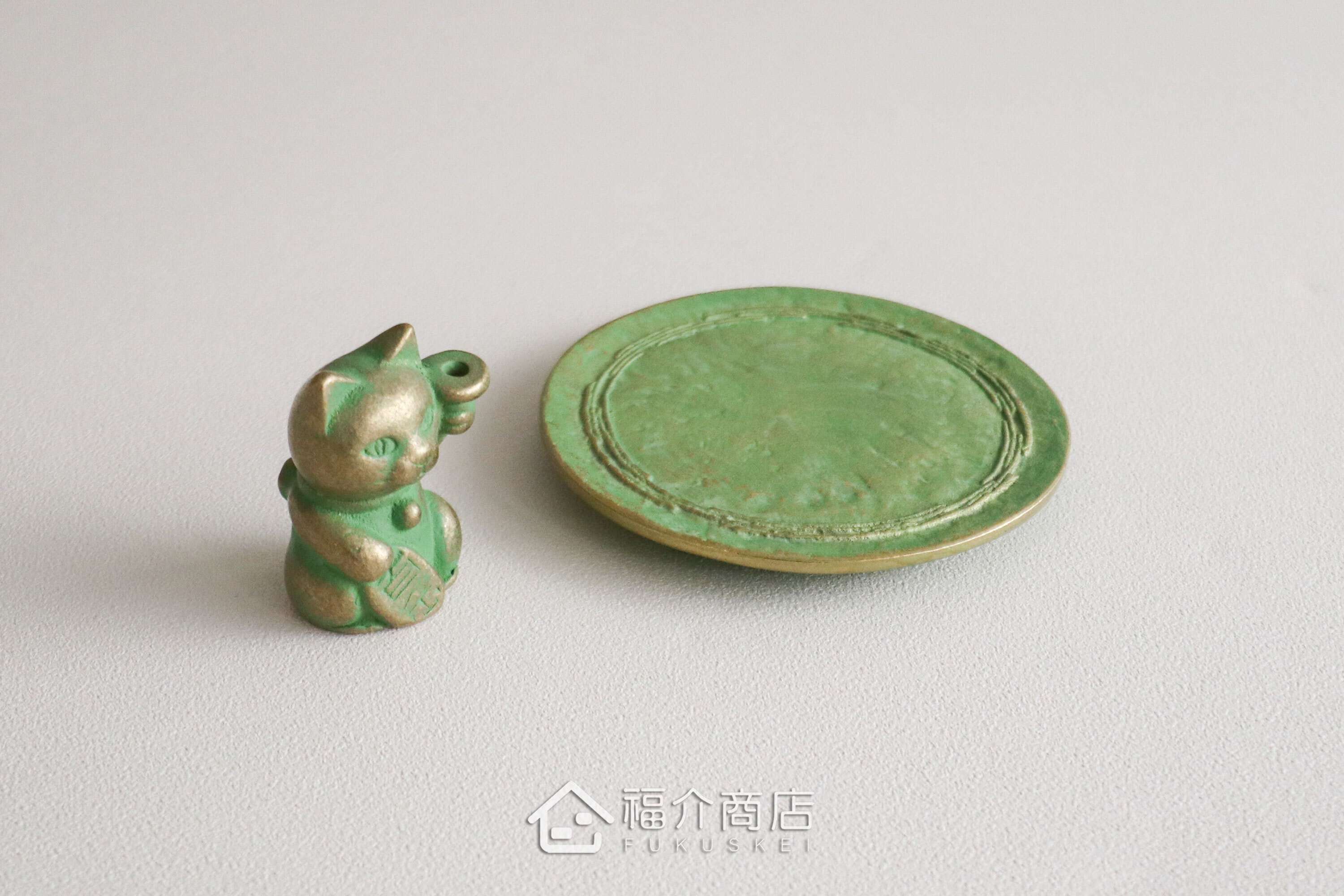銅製招財貓造型的線香座