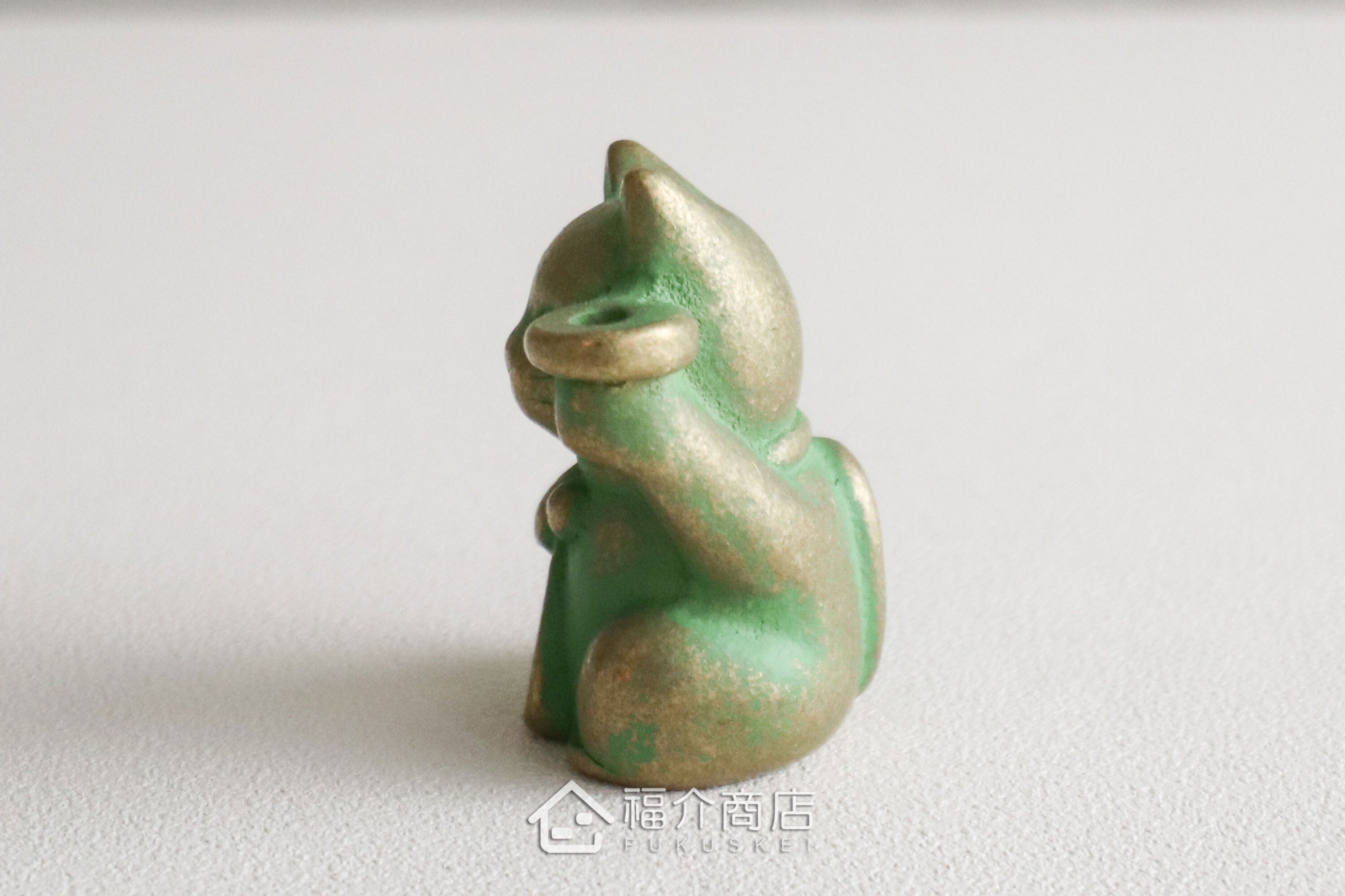 銅製招財貓造型的線香座