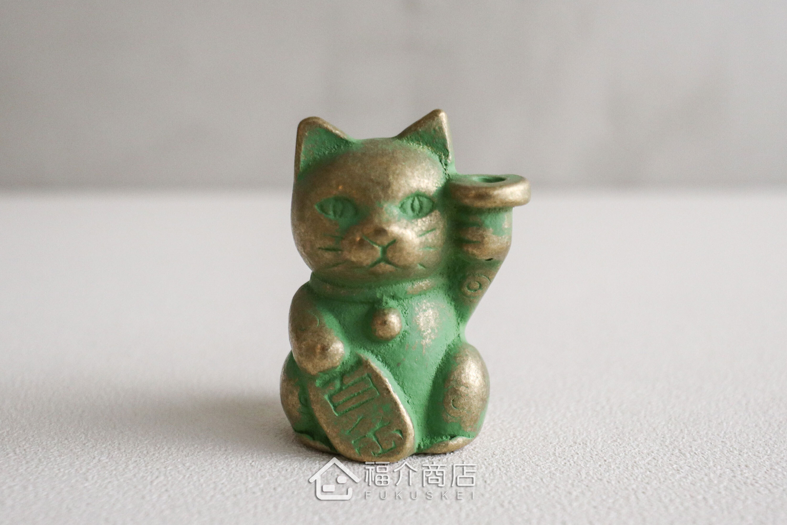 銅製招財貓造型的線香座