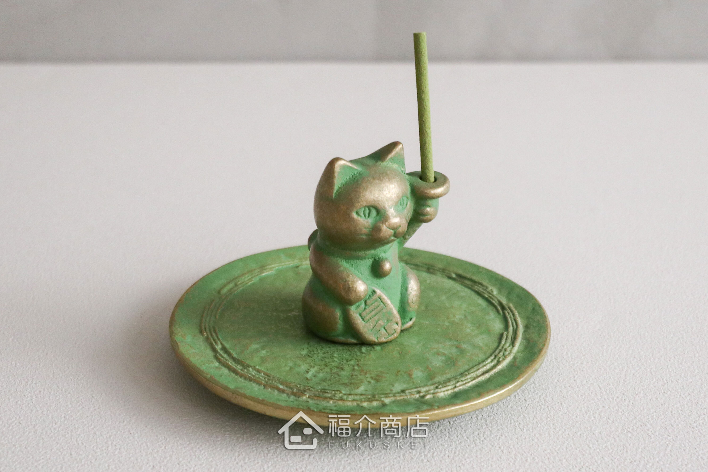 銅製招財貓造型的線香座