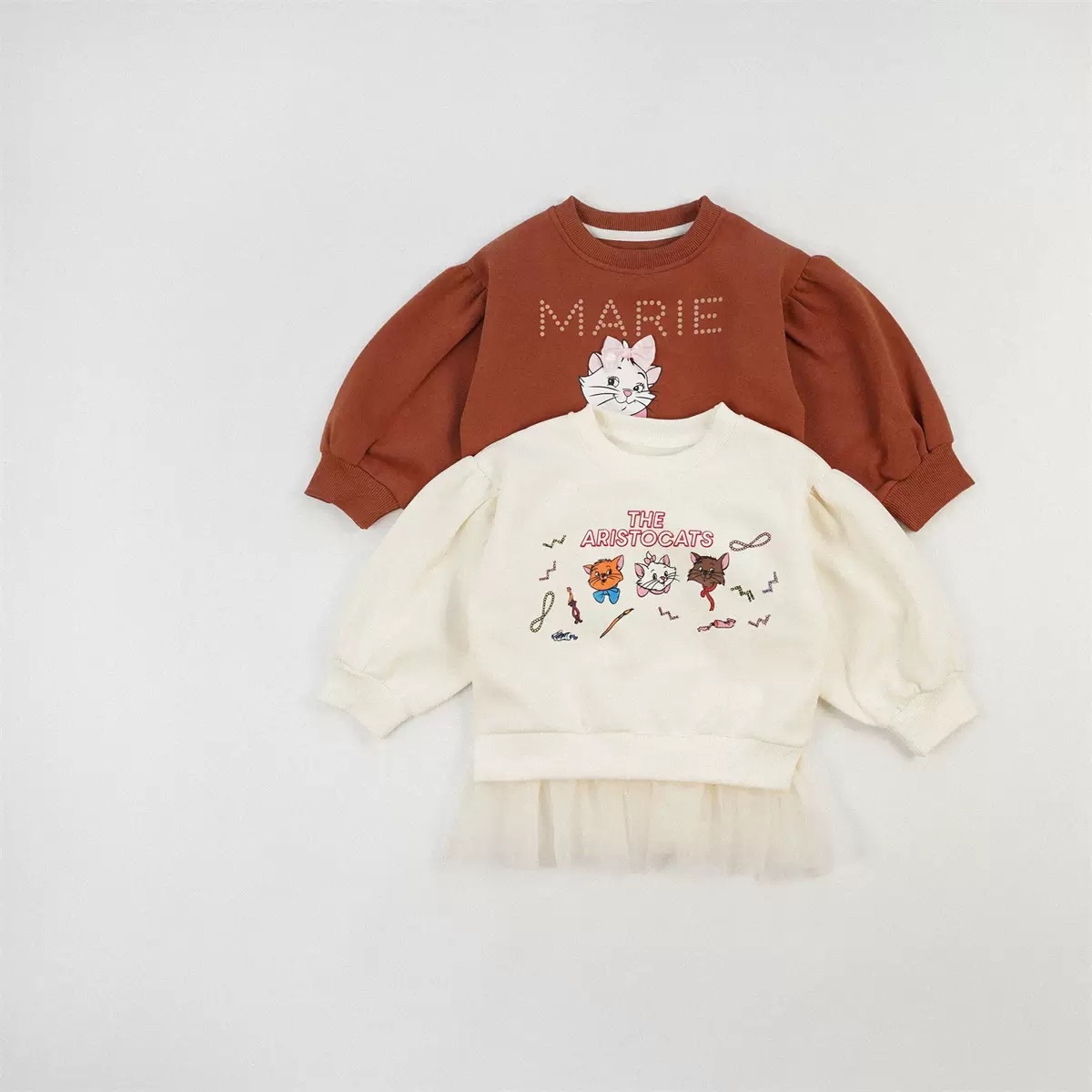 兩色貓貓拼紗泡泡袖上衣