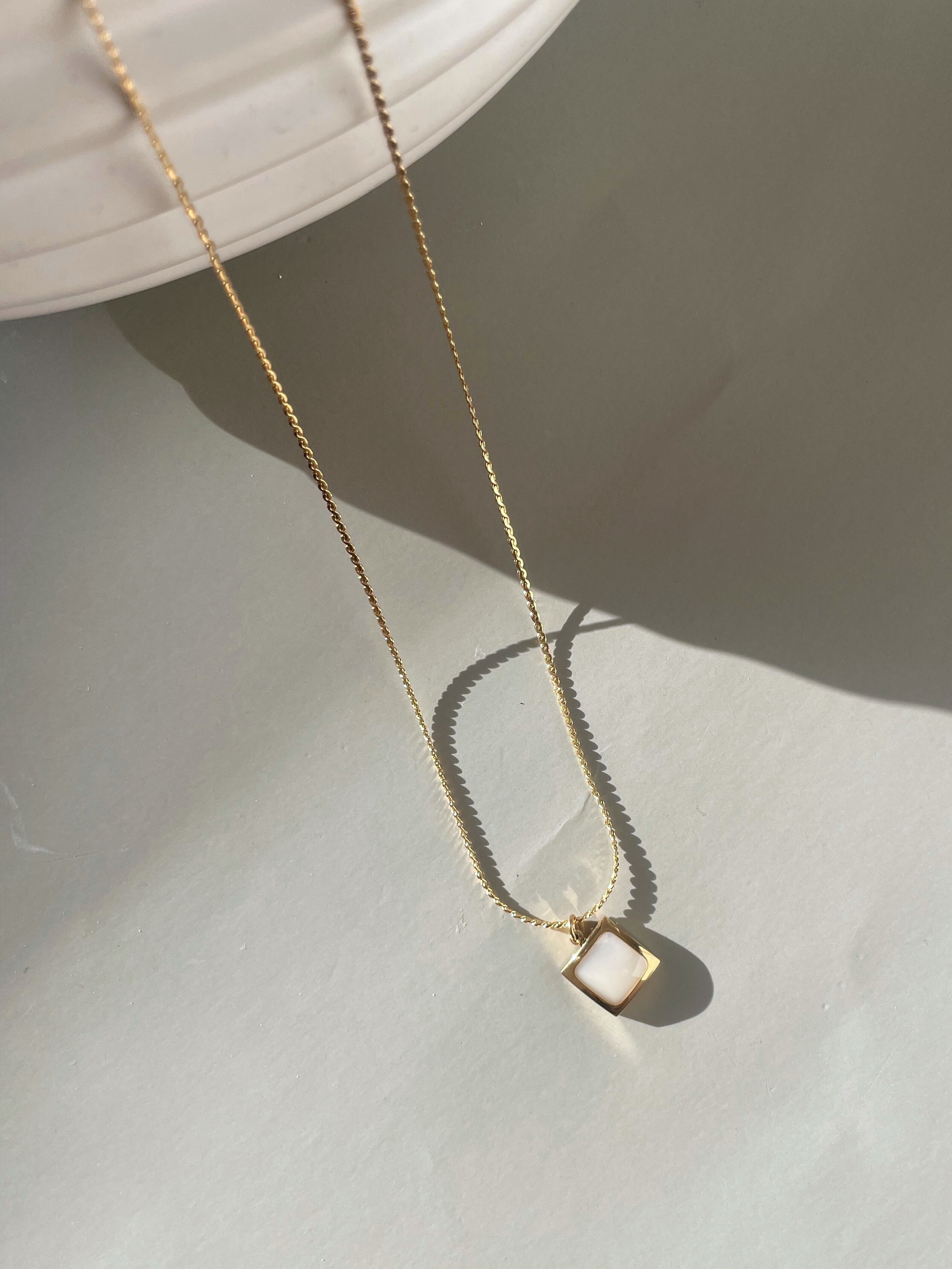 square shell necklace