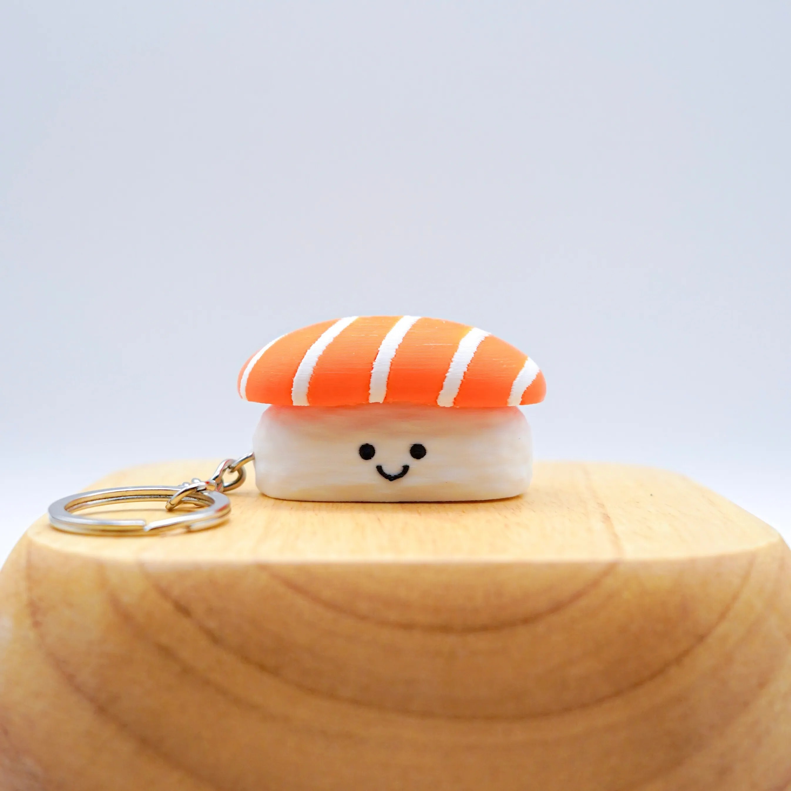 Smile Planet - The Sushi Bros | Smiling Fidget Keychain (Salmon)
