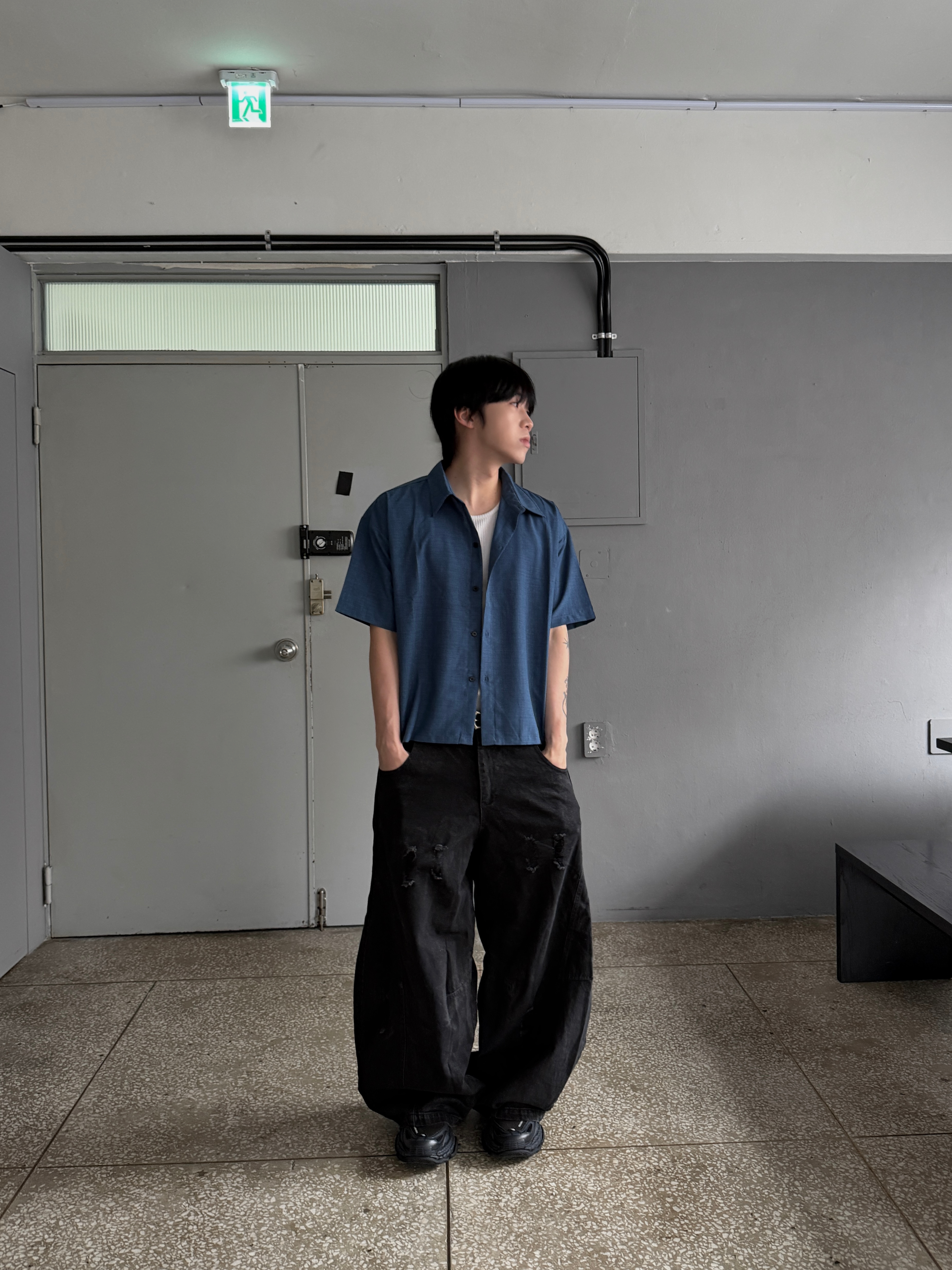 破壞水洗 塗層調節 寬大 彎刀闊腿牛仔褲