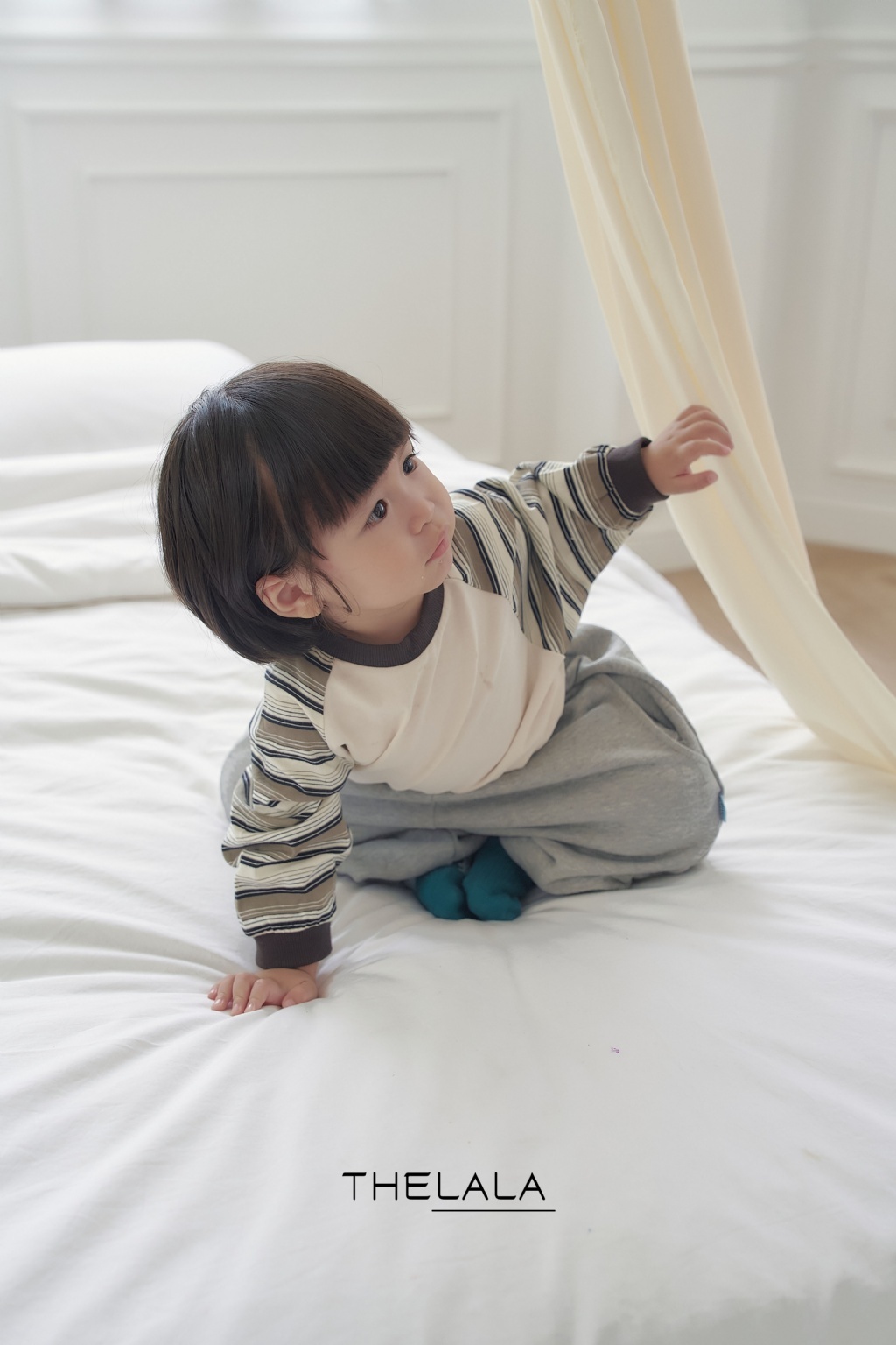 正韓秋Lalla 拼接橫條長袖上衣