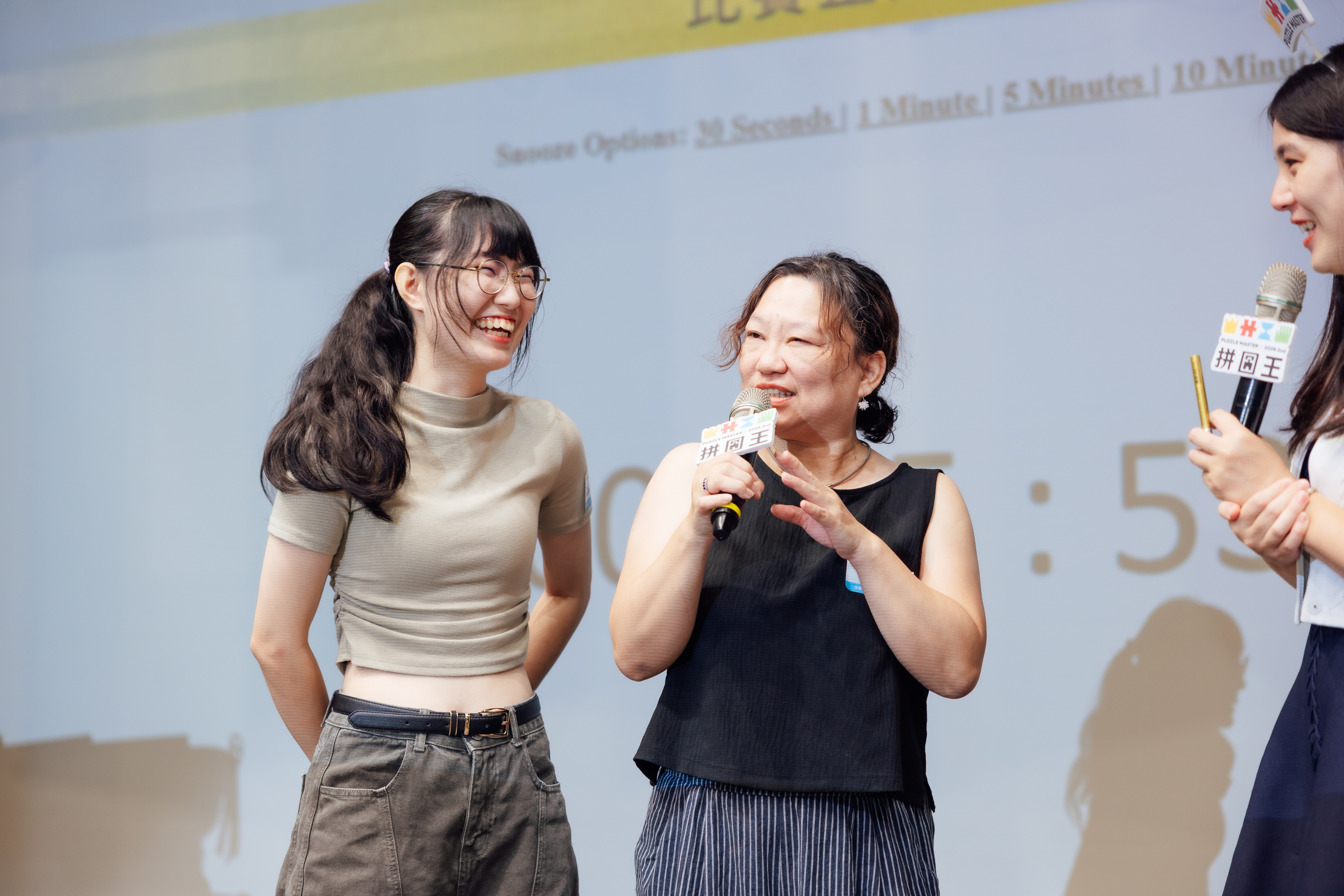 沈佳伃與王瑛文參加拼圖王