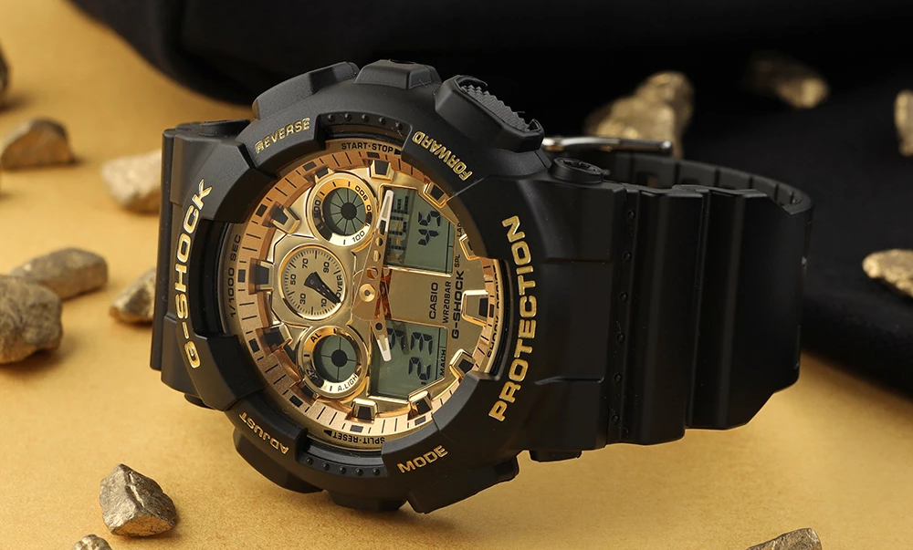 萬年鐘錶 - G-SHOCK  金色面盤大錶徑率性運動電子錶 GA-100GGB-1A9 錶徑 : 51.2 mm