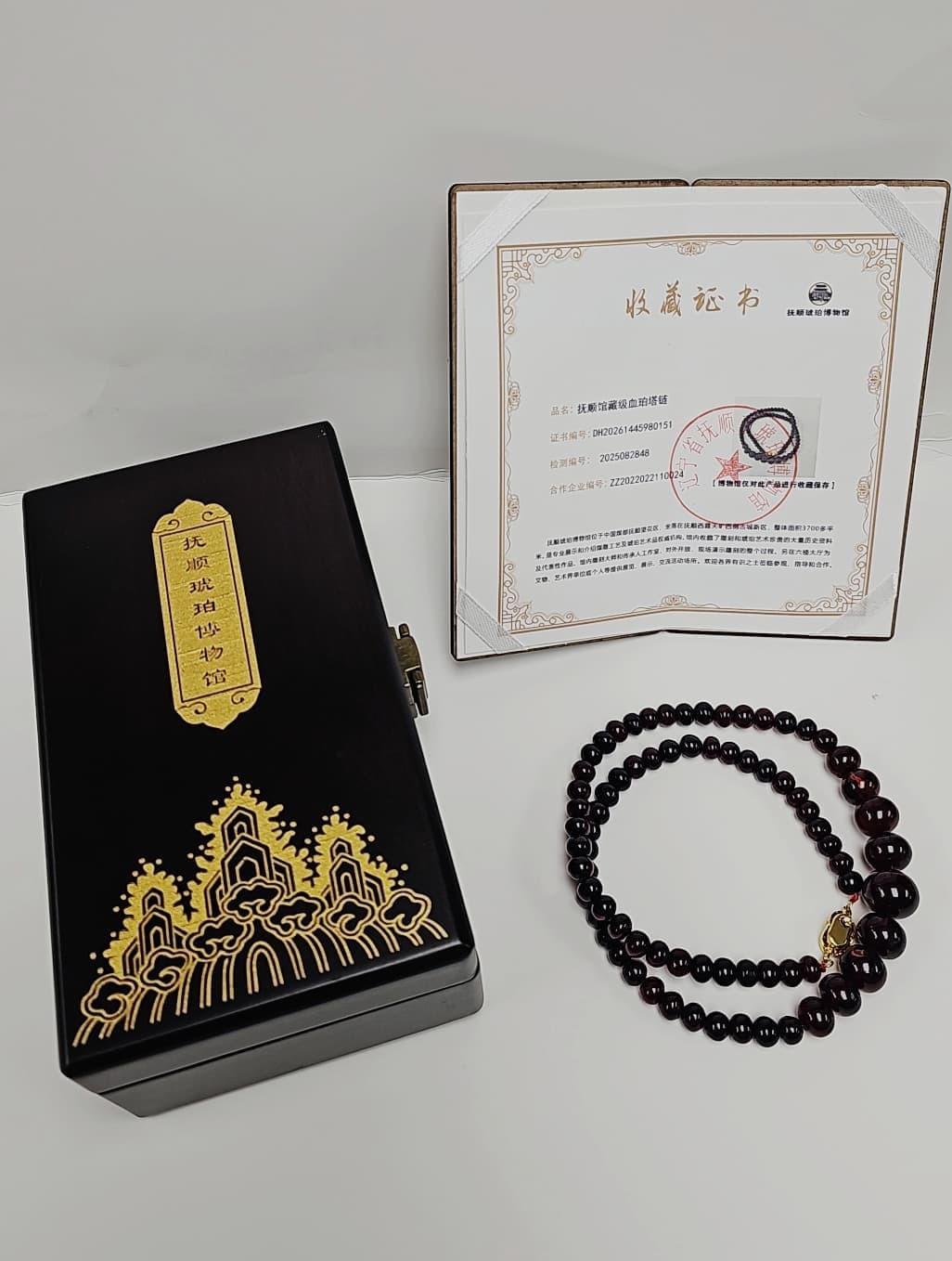 0601ST132-STOCK-MISC-撫順琥珀-龍滴血塔鏈14-7mm（P69）