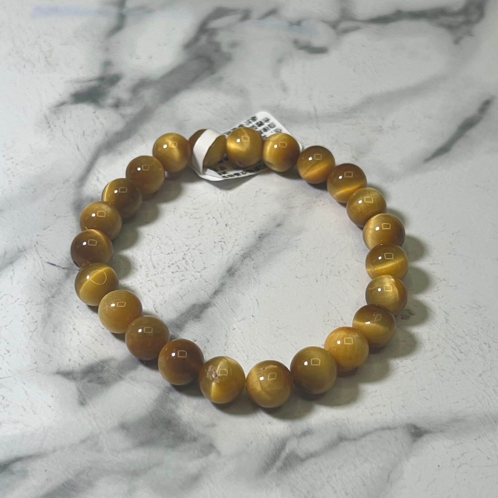 HKCG0822-140 (微瑕)金虎眼石8.6 mm (B5)