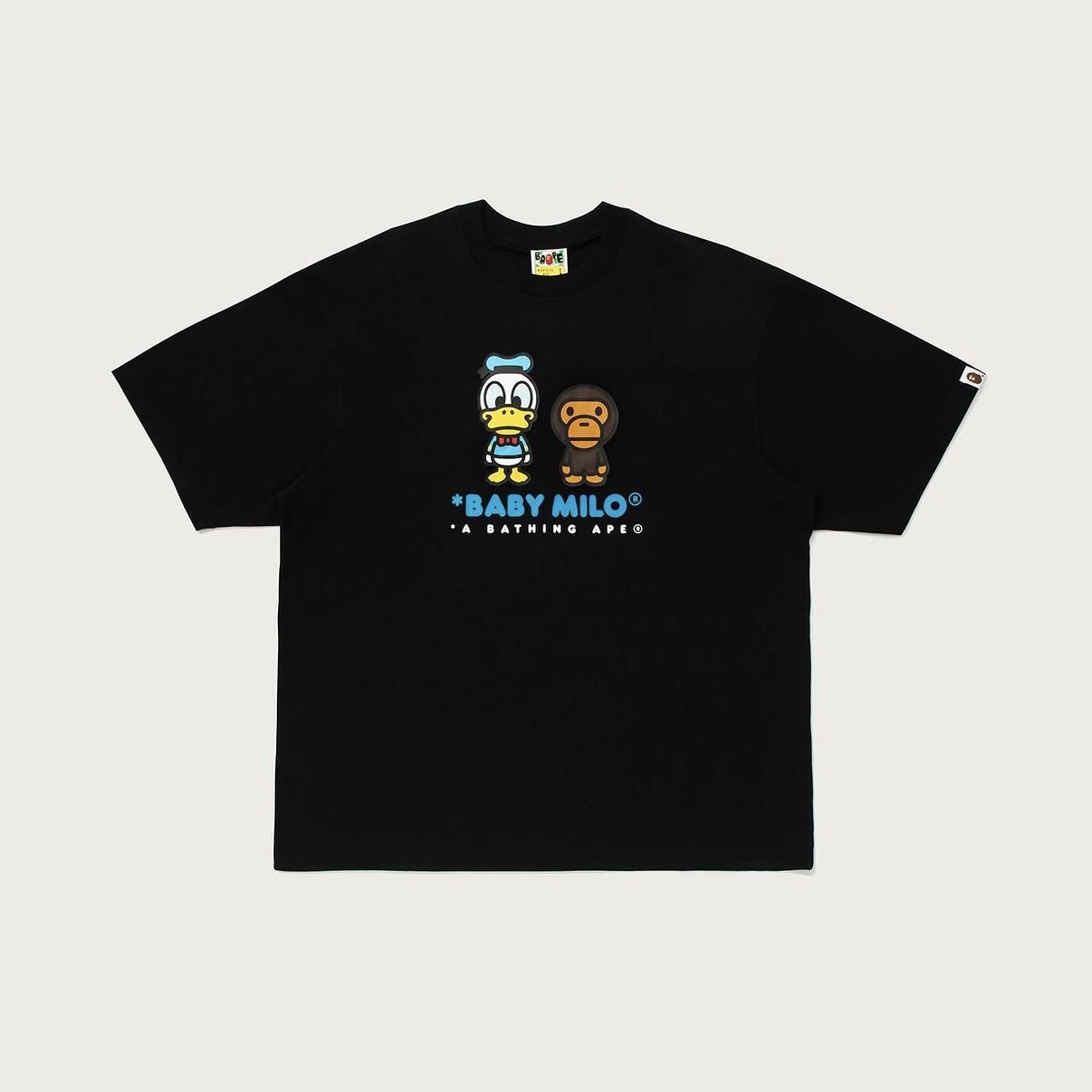-(B4b05)-A BATHING APE BAPE X DISNEY DONALD DUCK BABY MILO RELAXED FIT TEE 迪士尼聯名款 唐老鴨 寬鬆版 男款 短Ｔ 黑色/白色/深藍-2M23110917