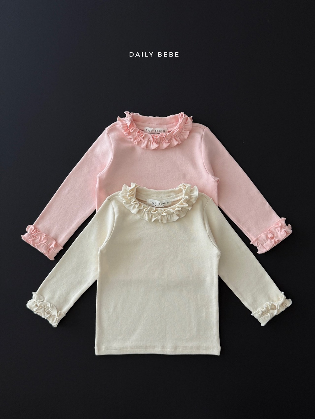 正韓秋Daily Bebe 兩色甜美花瓣邊上衣