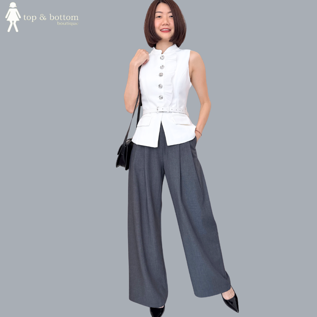 SLEEVELESS RUFFLED FRONT VESTED BLOUSE