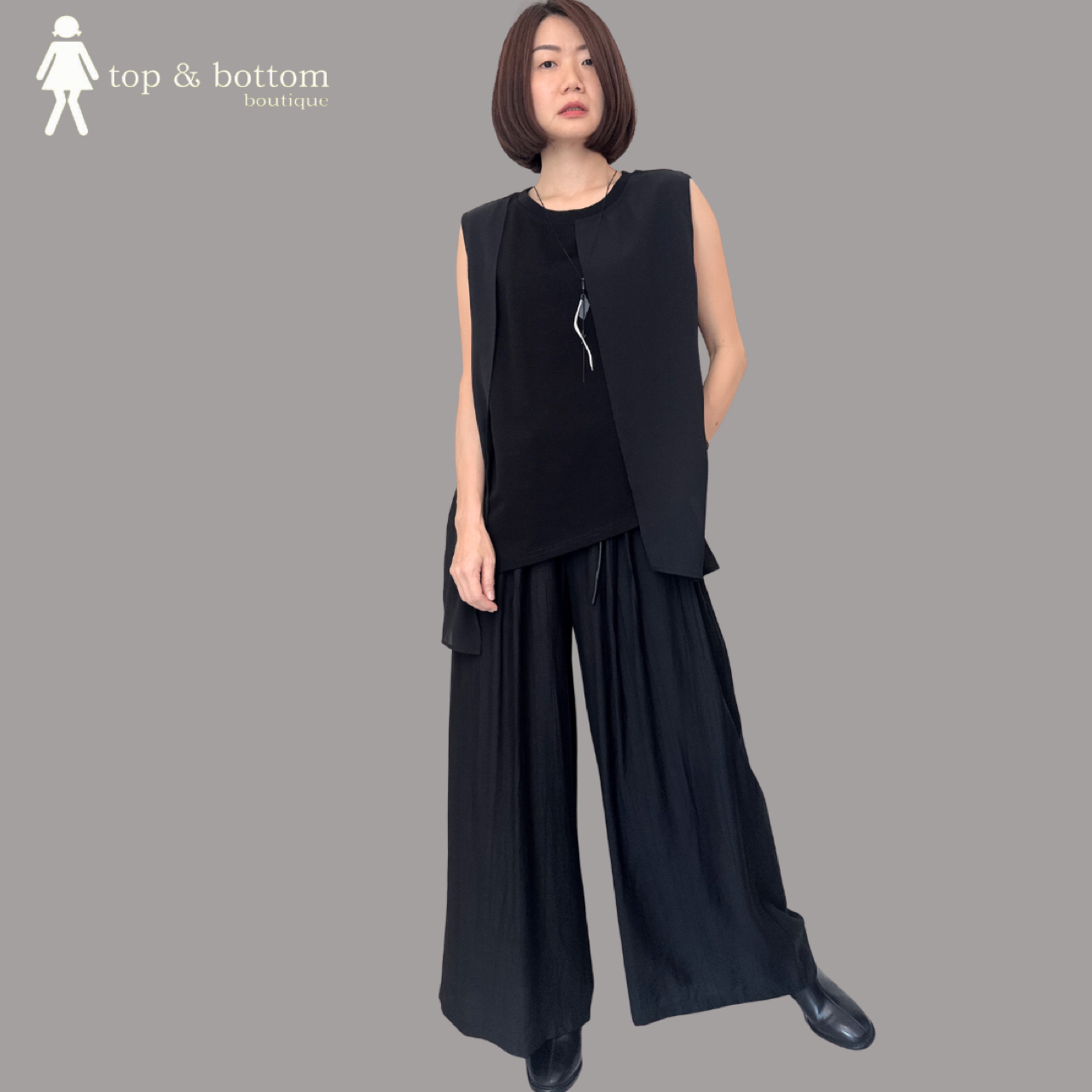 SLEEVELESS CHIFFON LAYERED FRONT CASUAL BLOUSE