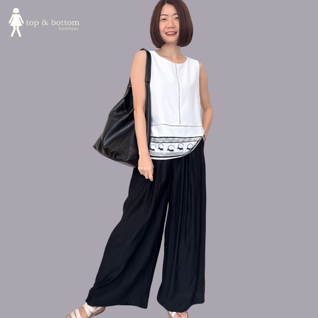 SLEEVELESS COTTON LINEN BLOUSE WITH PRINTED HEM