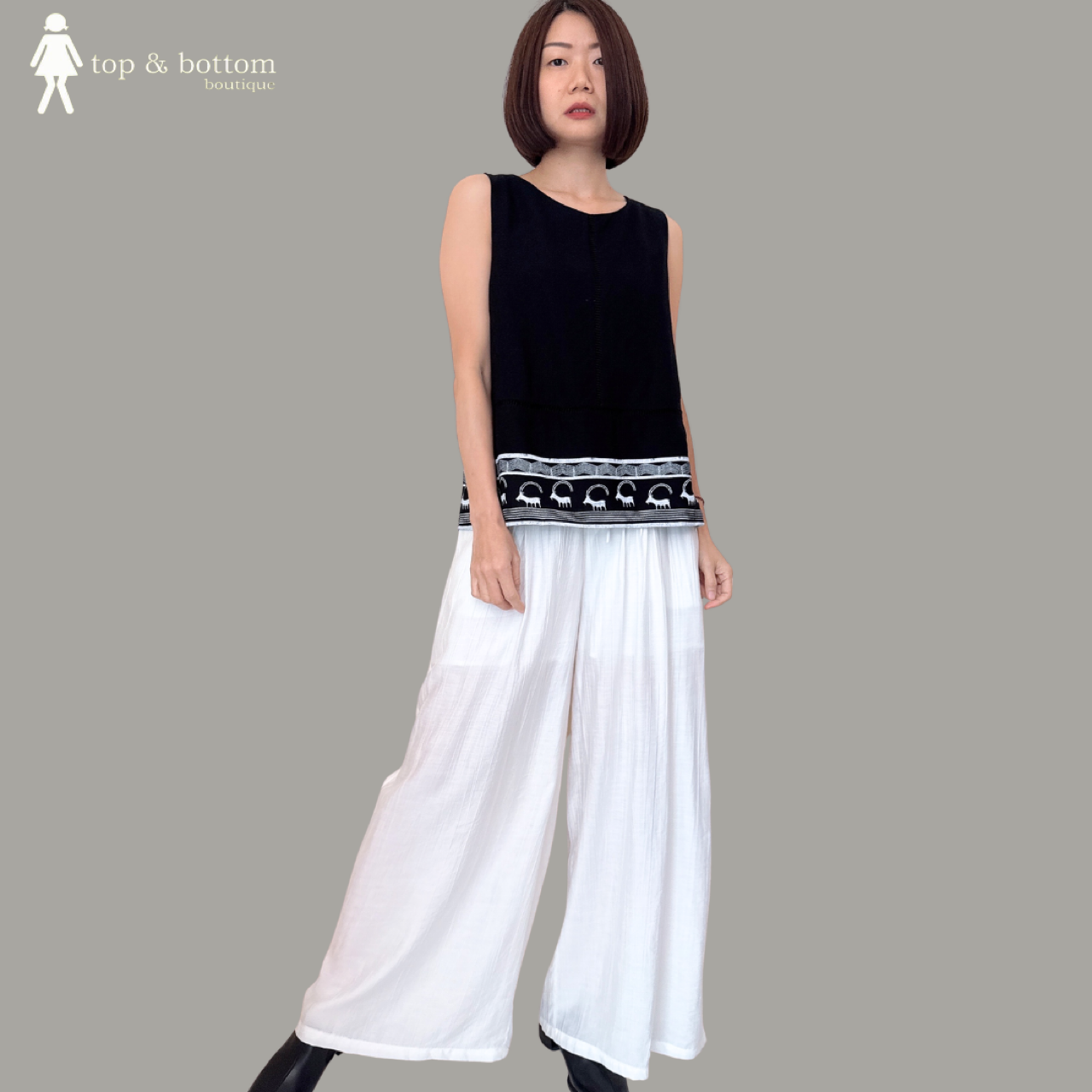 SLEEVELESS COTTON LINEN BLOUSE WITH PRINTED HEM