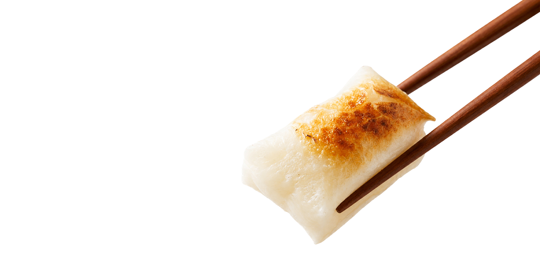 筷子夾著烤麻糬