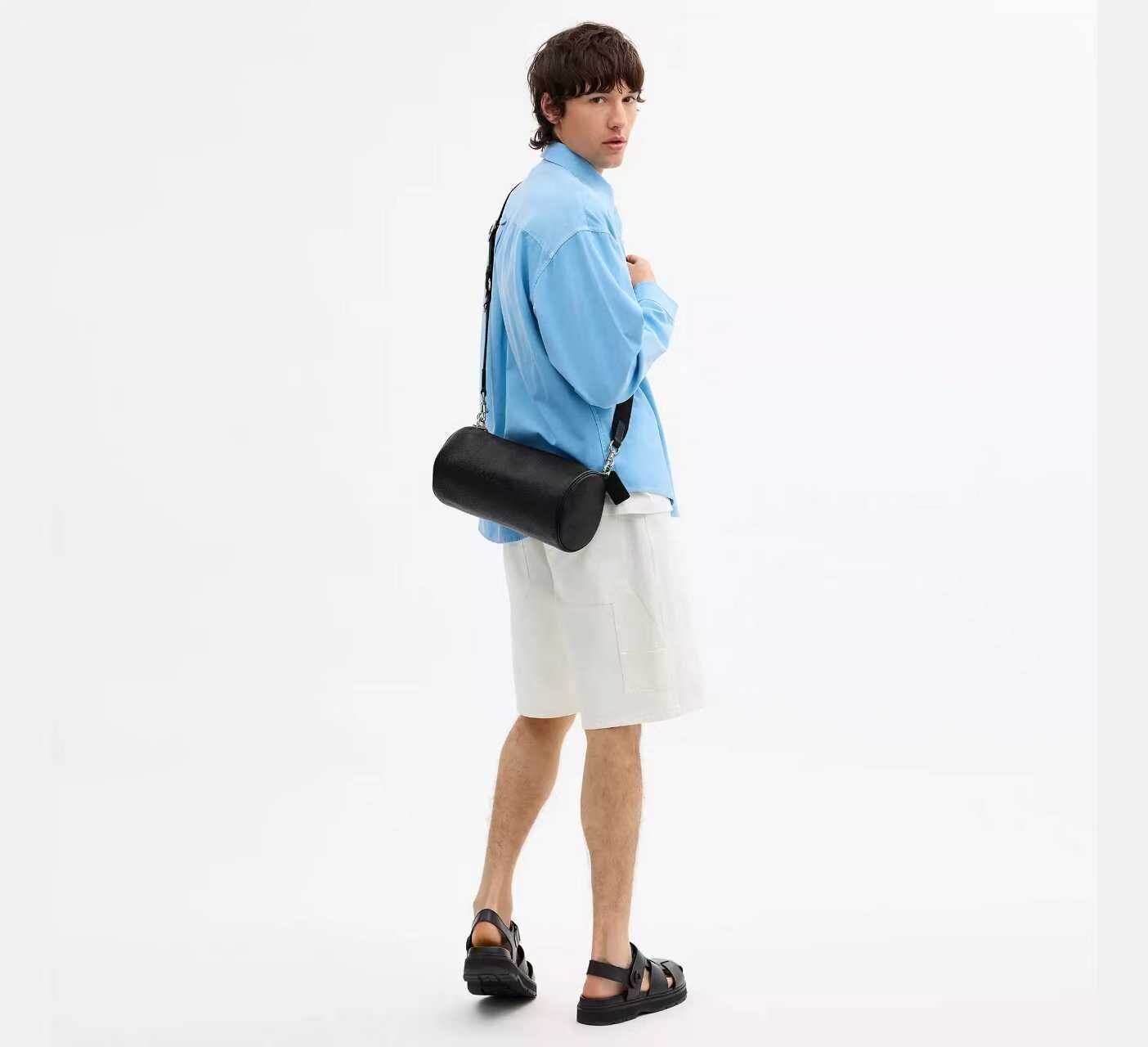 【預購】COACH H090357 Andre 圓筒包 (30號)