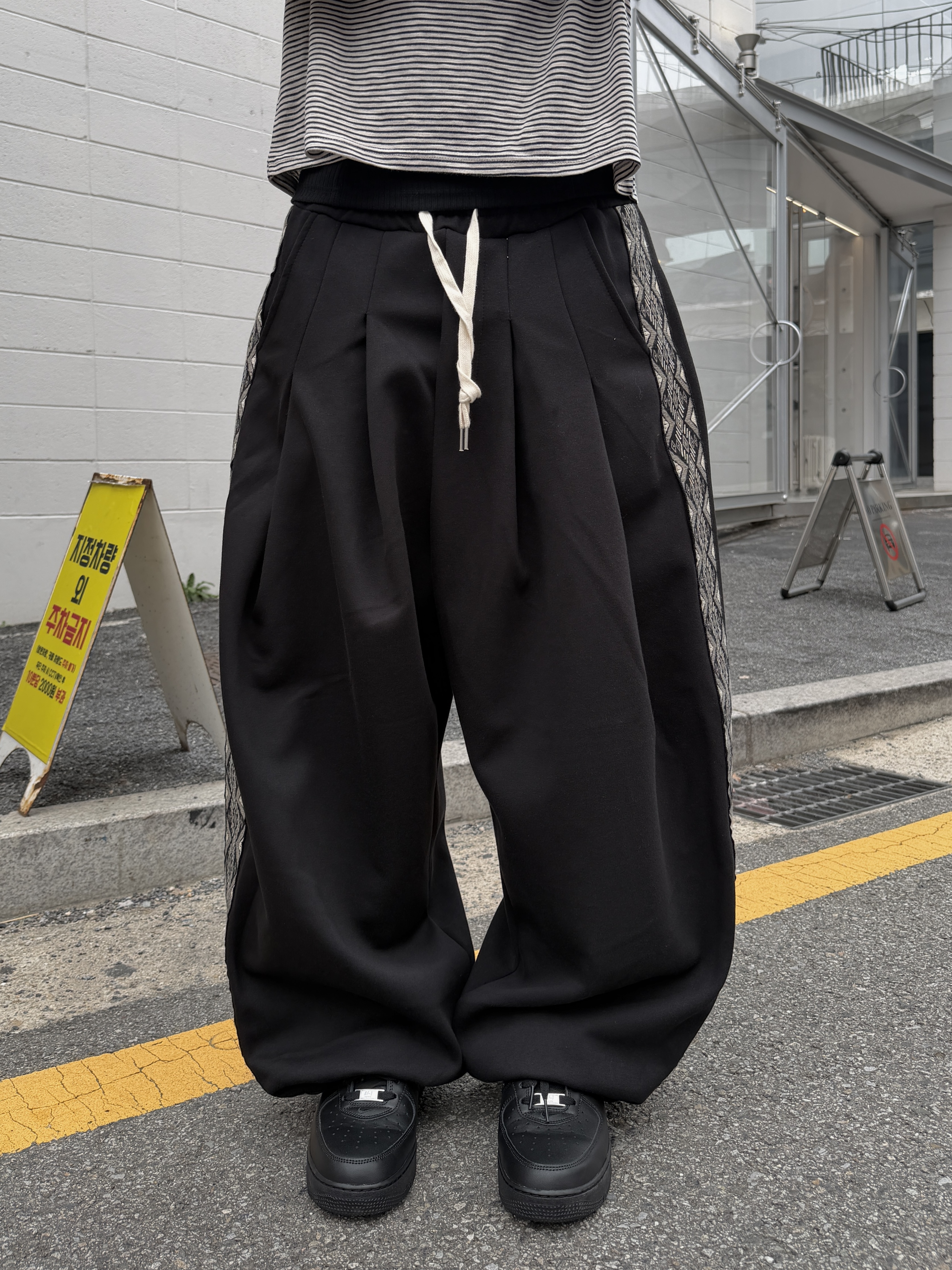 側拼接 阿拉丁圖騰 寬鬆棉褲