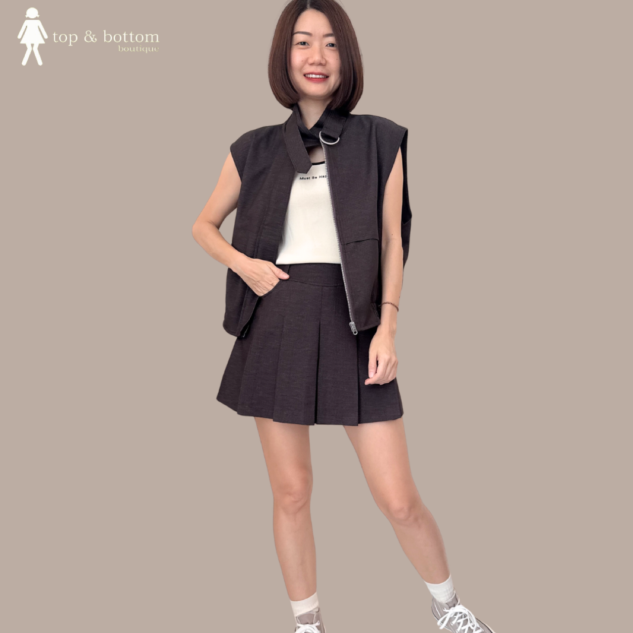 BUCKLED HIGH NECK BUBBLE VEST