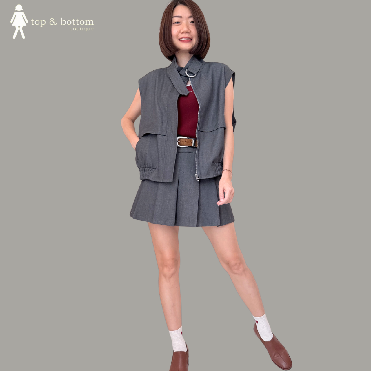 SHORT PLEATED SKIRT