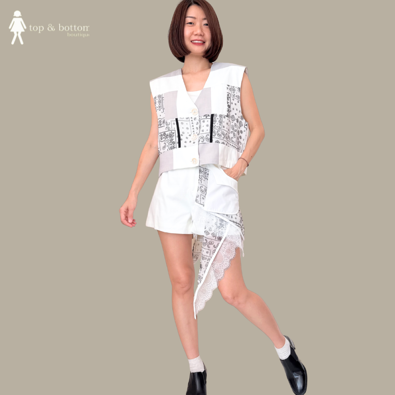 SLEEVELESS PRINTED COLLAGE VESTED BLOUSE