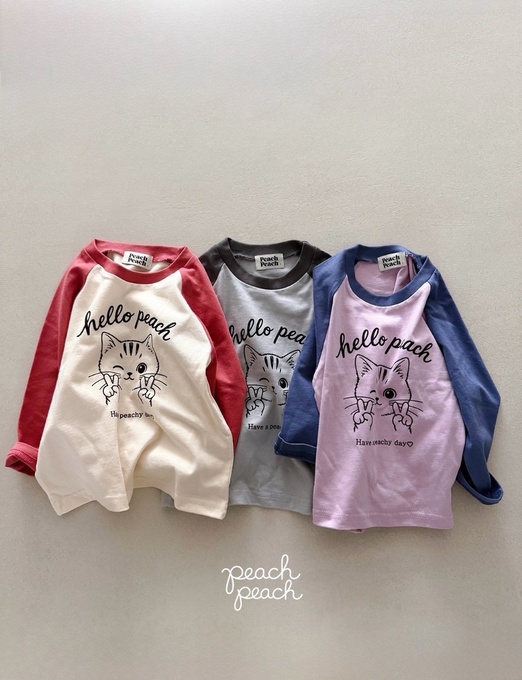 正韓秋PEACHPEACH 三色拼袖呀比貓貓上衣