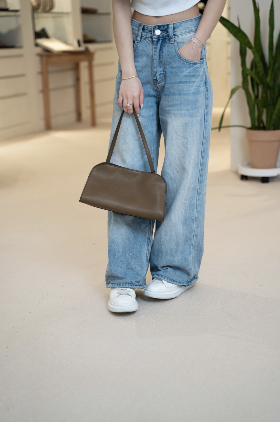 The Row Peggy Clutch saddle leather Deep Brown