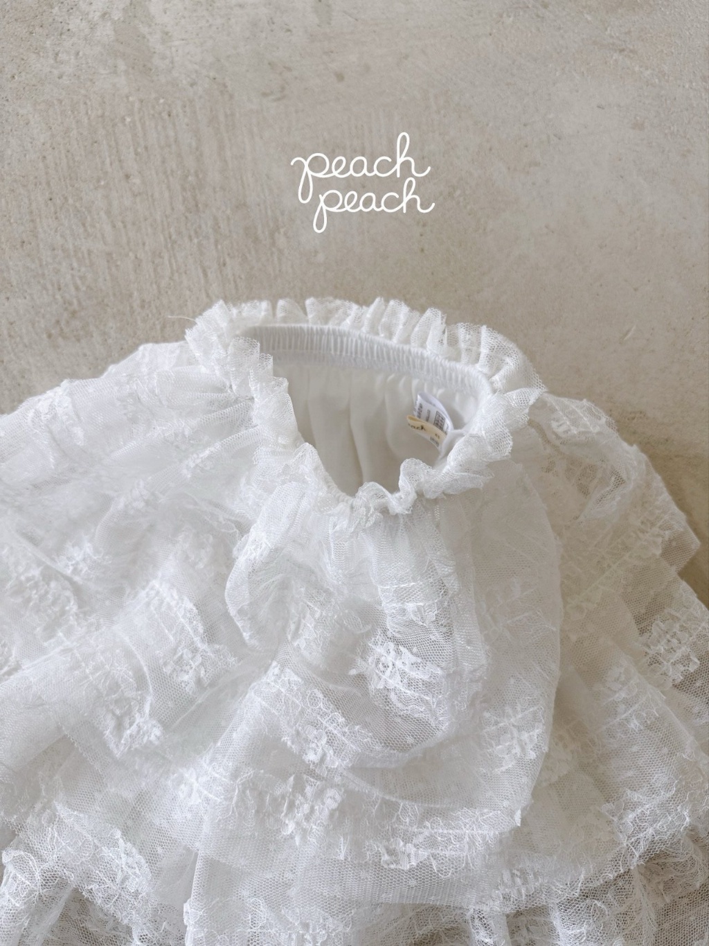 正韓秋PEACHPEACH 兩色蕾絲羽毛蛋糕裙