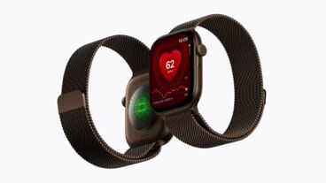Two Apple Watch Series 12 with Milanese loops showing heart rate and rear sensors
