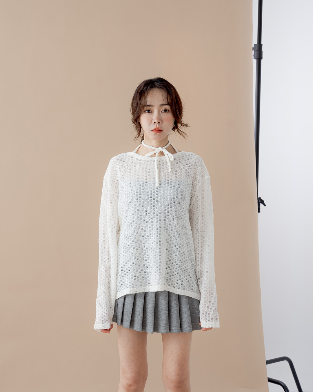 Wide-fit knit top with cut-out lace-up detailing – available in three colors.【01013535】in stock+pre-order