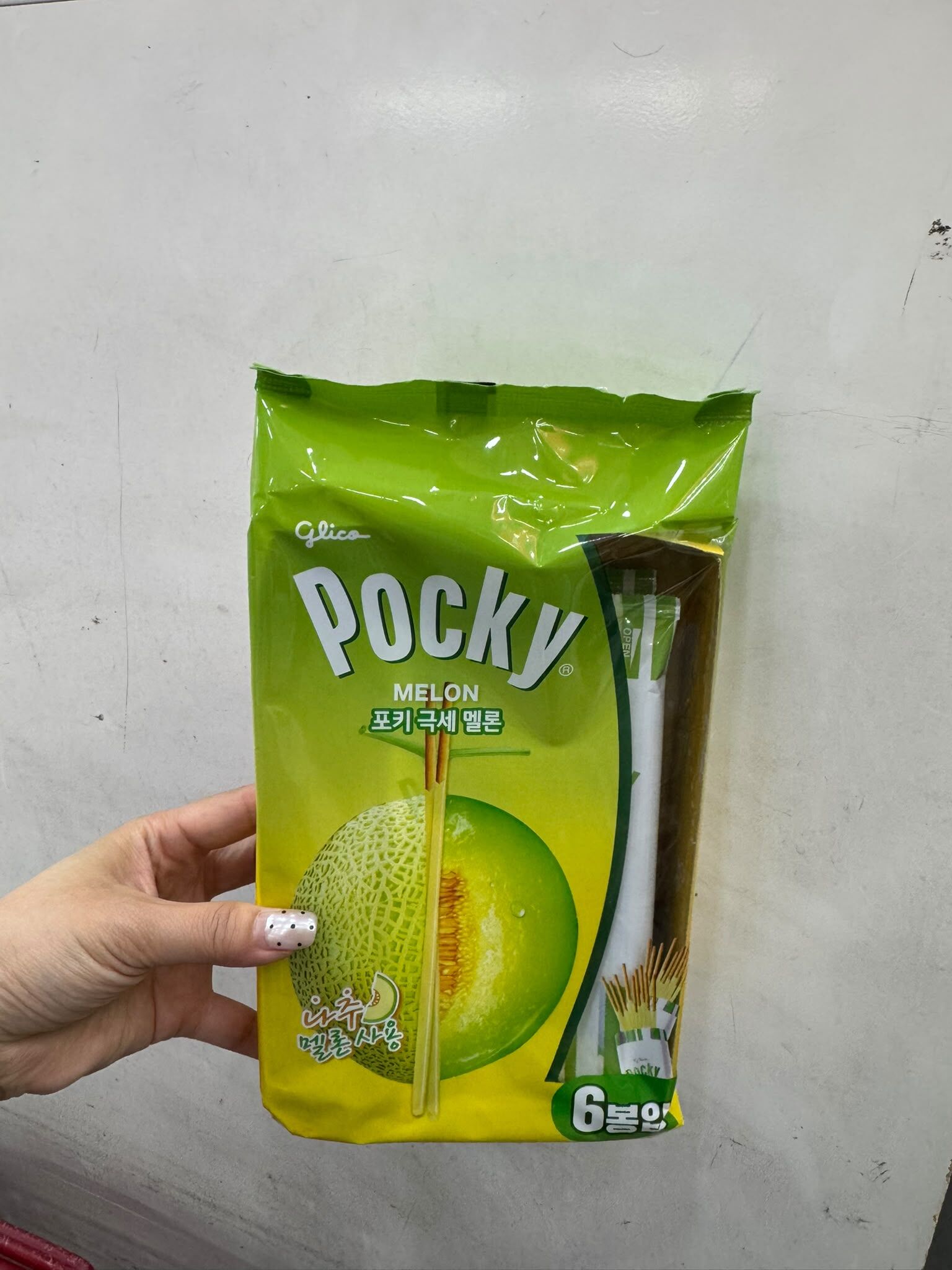 EQ62  Glico Pocky 極細哈密瓜口味（132克，內含6小包）$59/1 $115/2