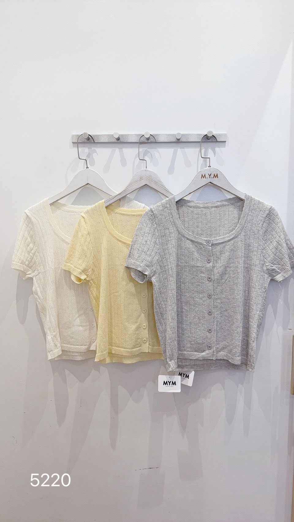 Lace-trimmed jacquard knit top