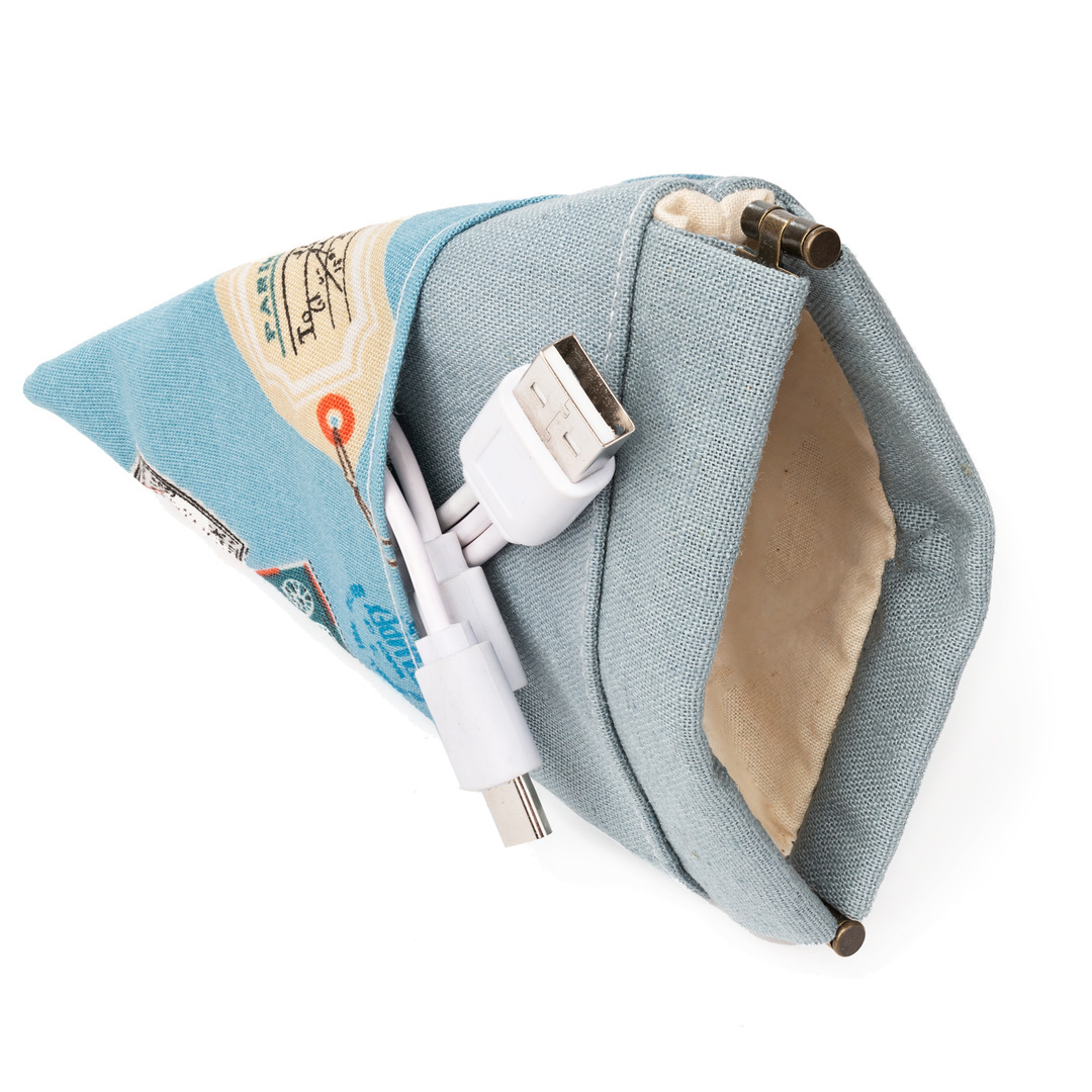 Open triangle spring-frame pouch holding a charging cable