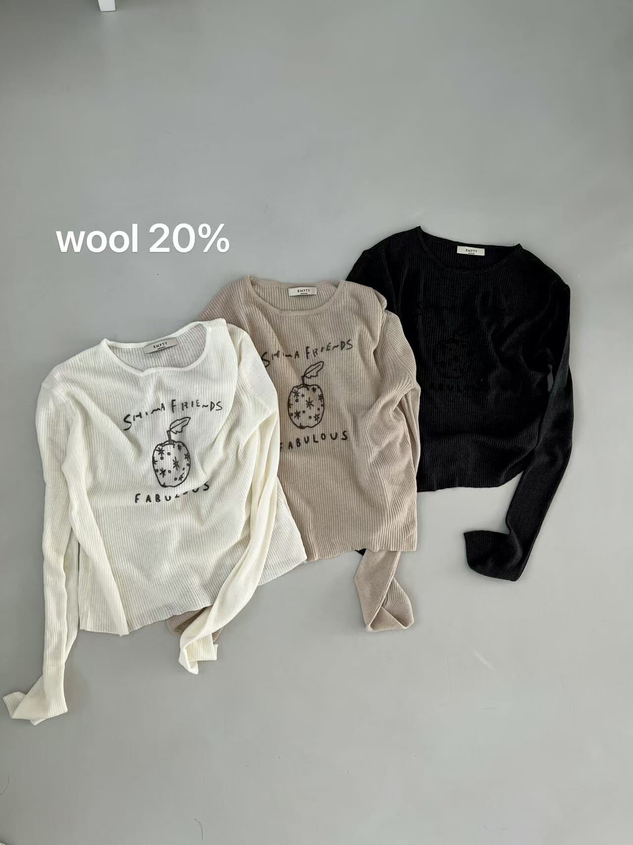 EM7102 羊毛混紡塗鴉蘋果坑條上衣