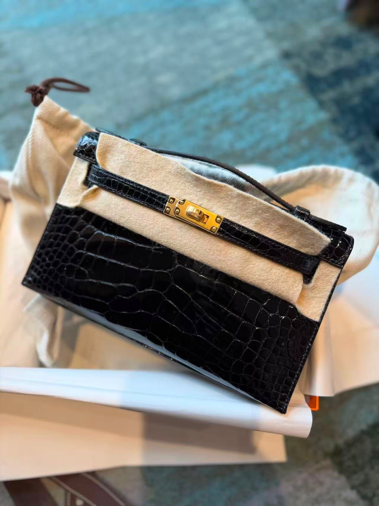 Kelly pochette 89 noir ck shinny alliagtor G