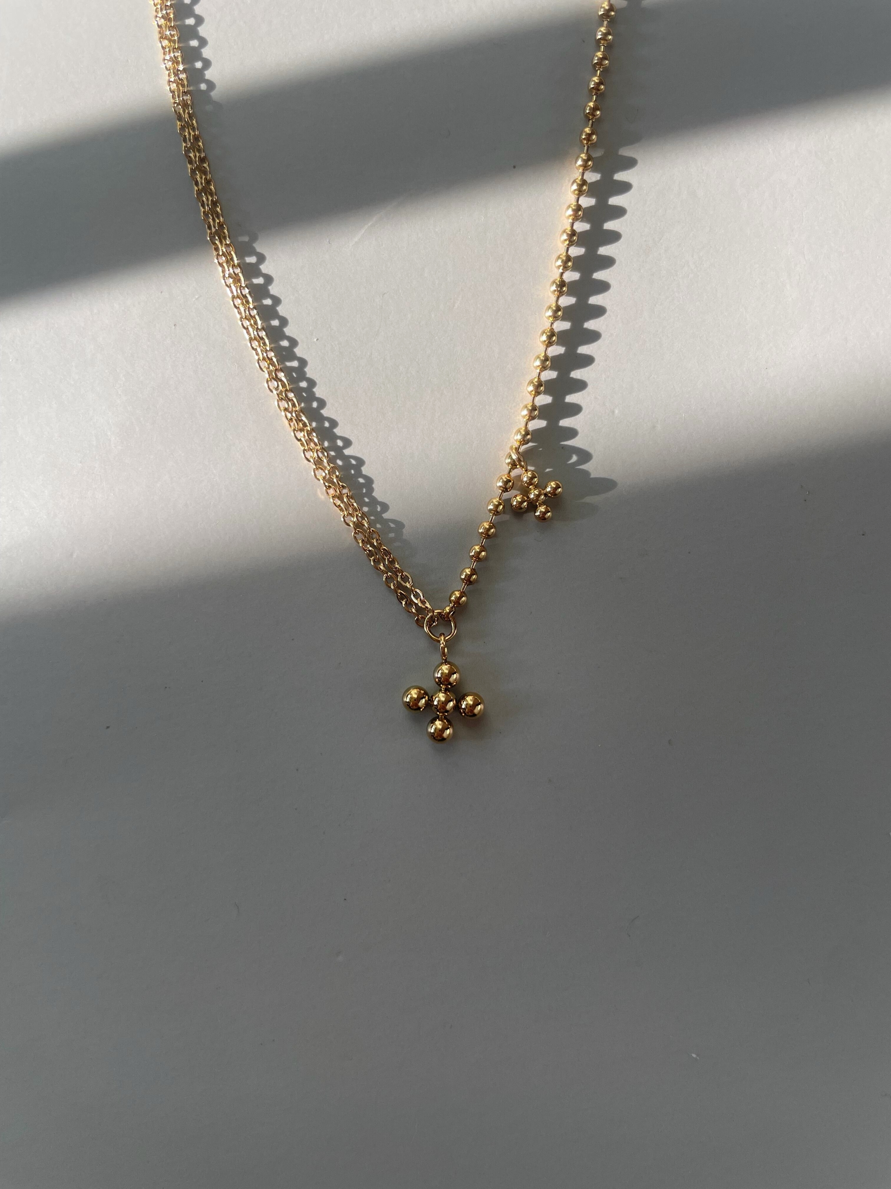 dot cross necklace