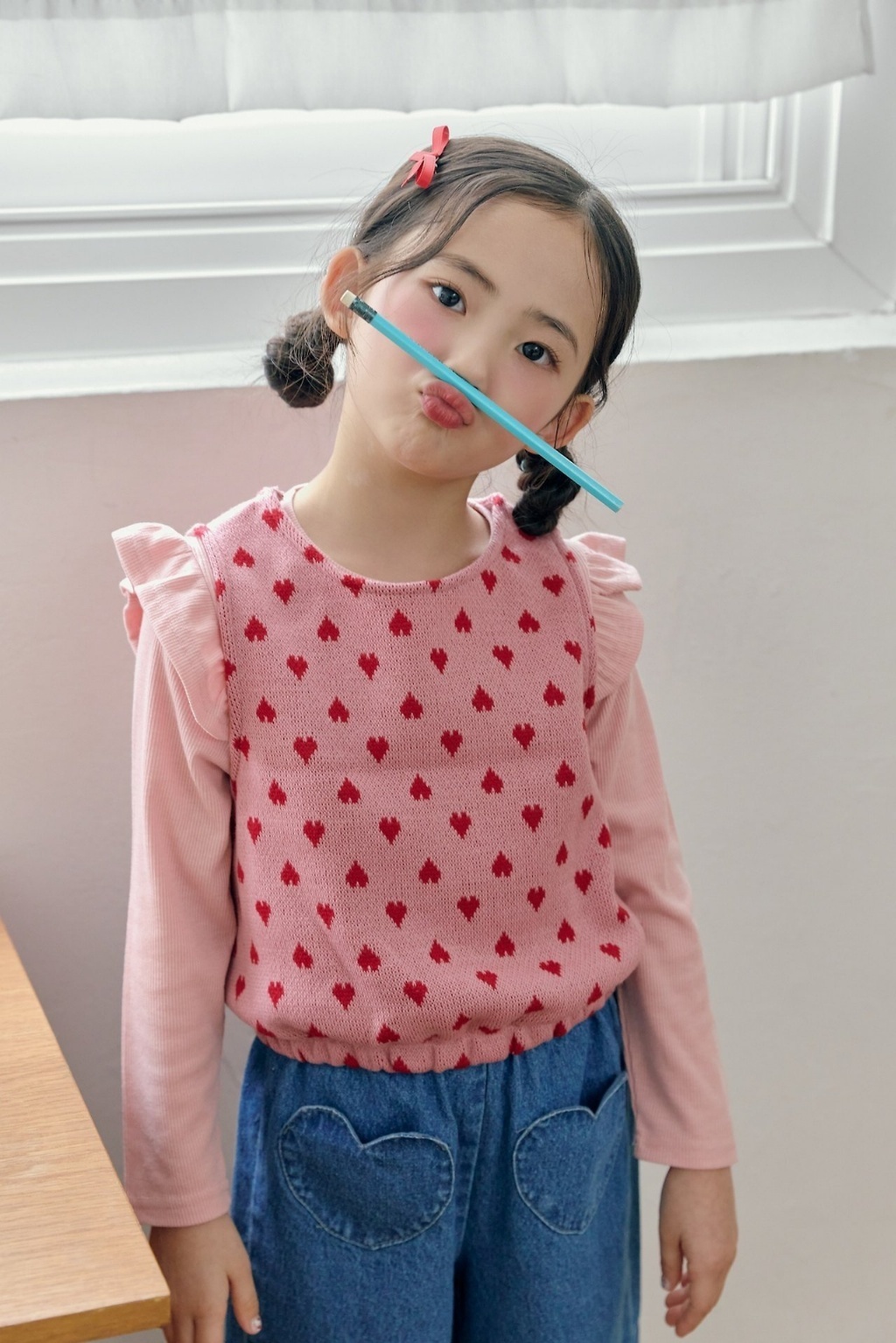 正韓秋bbb 兩色愛心縮腰背心