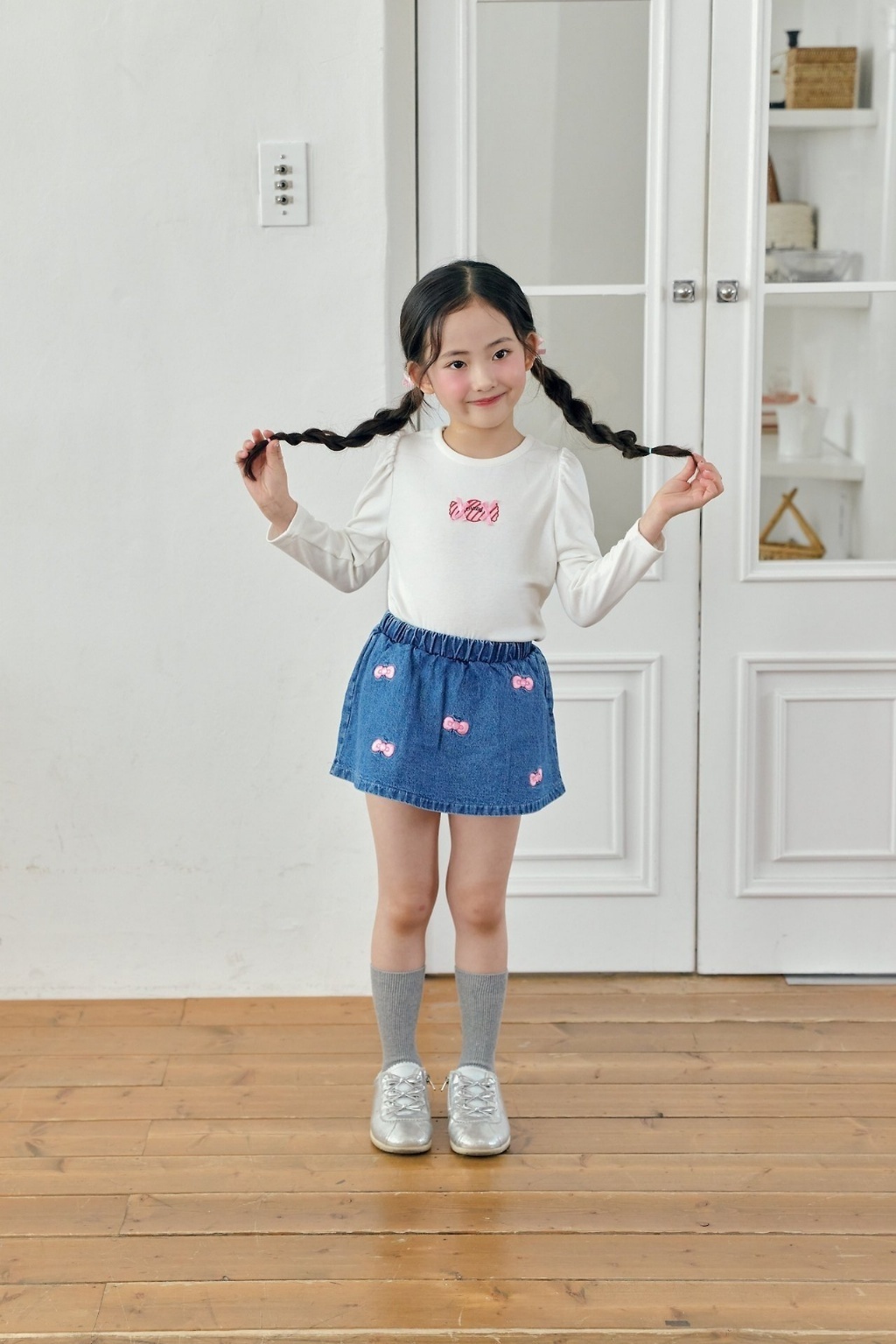 正韓秋bbb 刺繡蝴蝶結牛仔裙褲