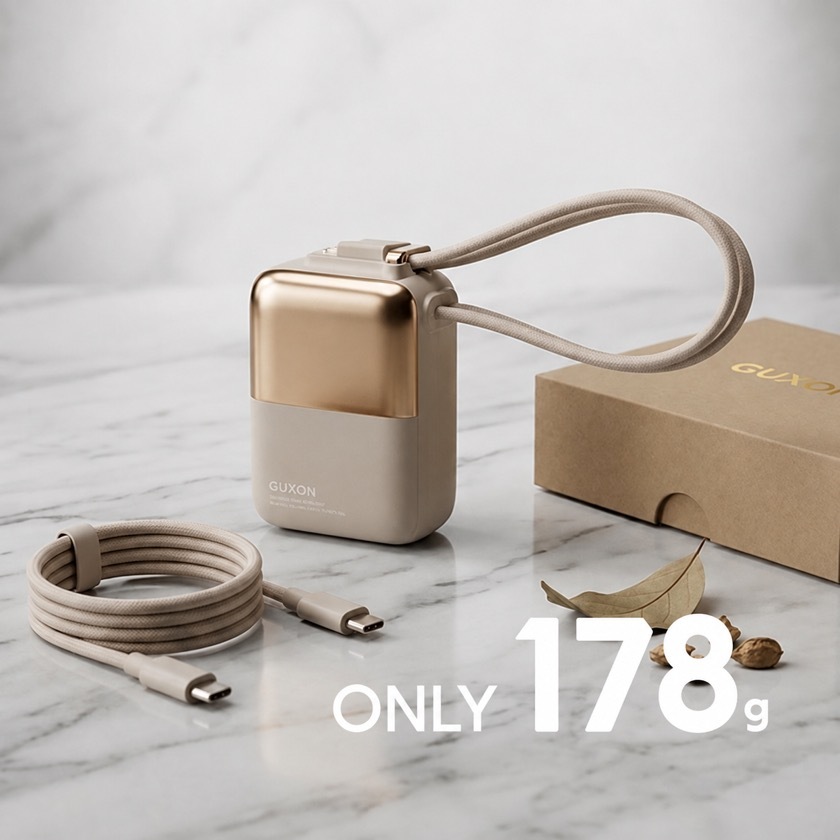 Cube solid-state dual-cable power bank in gold, weighing just 178g