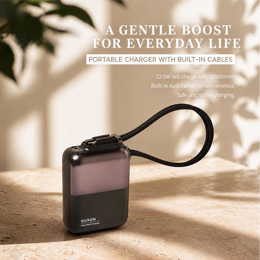 Cube solid-state dual-cable power bank in black, lifestyle shot of a portable power bank with built-in cables